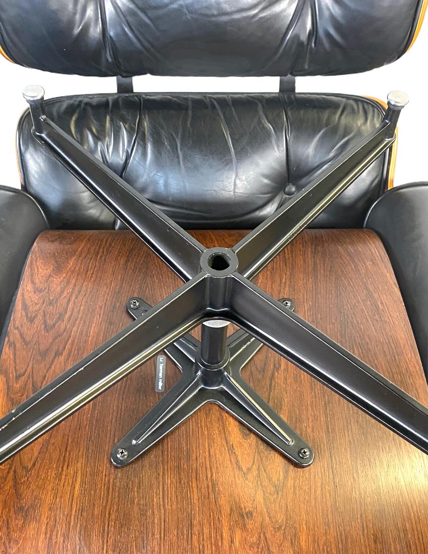 A gorgeous vintage edition Eames lounge chair and ottoman, circa 1970s. Classic Herman Miller edition in stunning vibrant wood with black leather. Handsome grains pattern but not too loud. Extremely comfortable foam cushions with no hardening. Chair