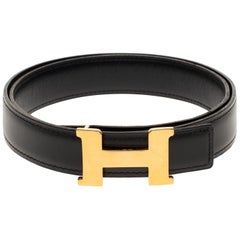 Beautiful Hermès belt in black calfskin and gold plated metal buckle