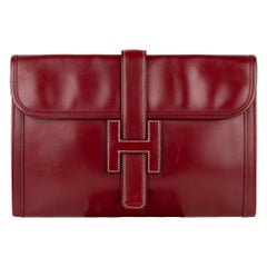 Beautiful Hermès "Jige" Clutch in burgundy box leather