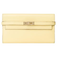 Magnifique portefeuille Kelly Hermès en cuir de veau Poussin Epsom jaune, GHW