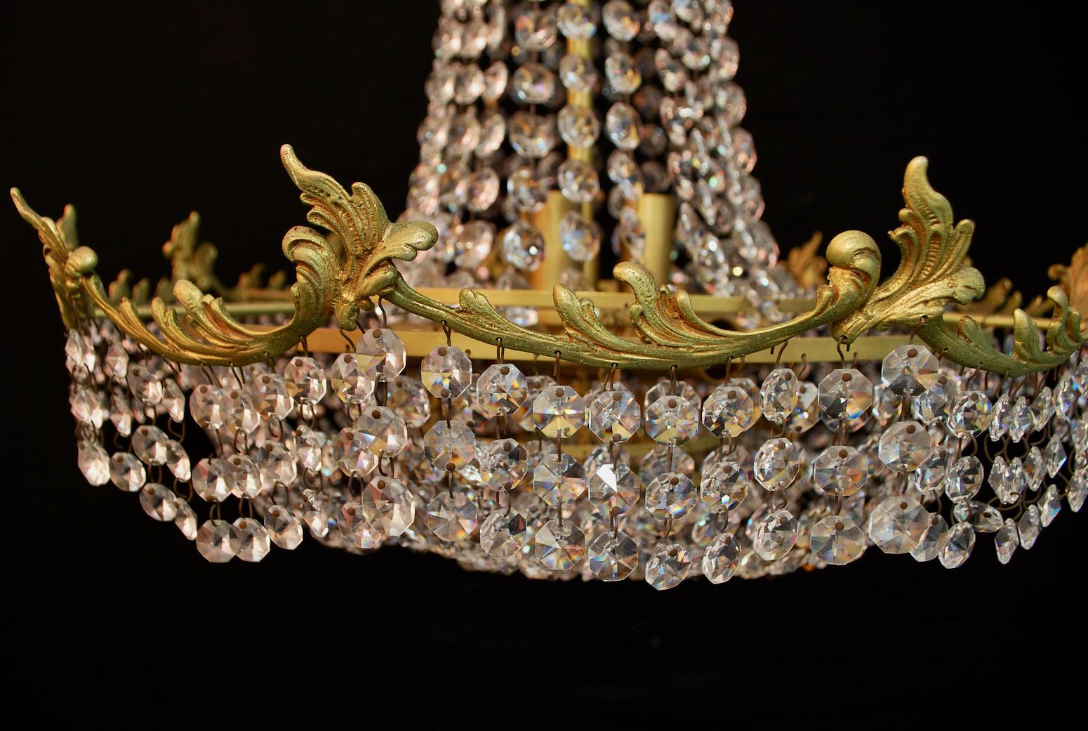 A beautiful and elegant Hollywood regency chandelier.