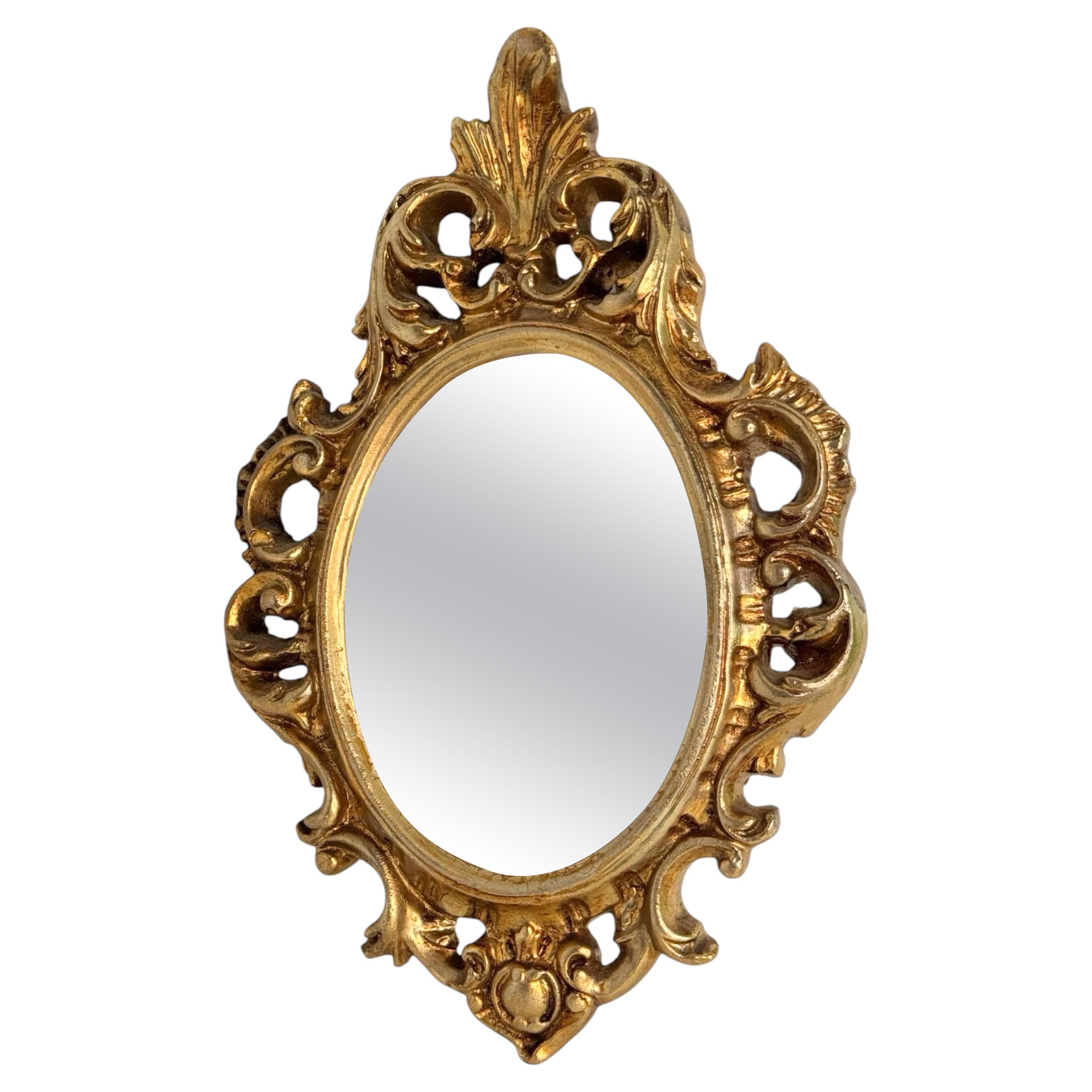 Bellissimo specchio di vanità Hollywood Regency in toleware dorato Vintage Italia