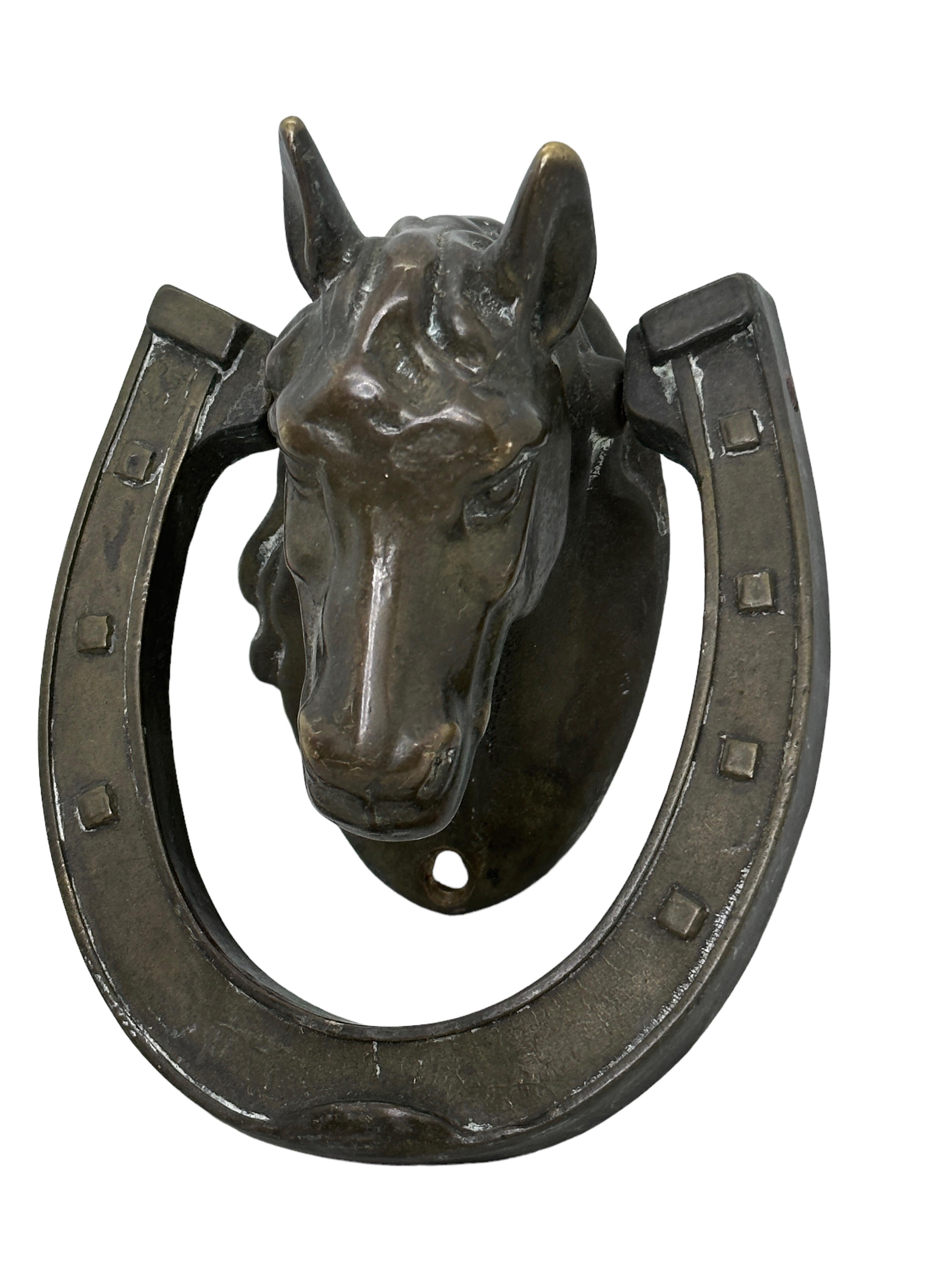 Classic 19th century European Horse head door knocker, made of Bronze. Nice addition to your front door. Found at an estate sale in Vienna, Austria. It is not marked.