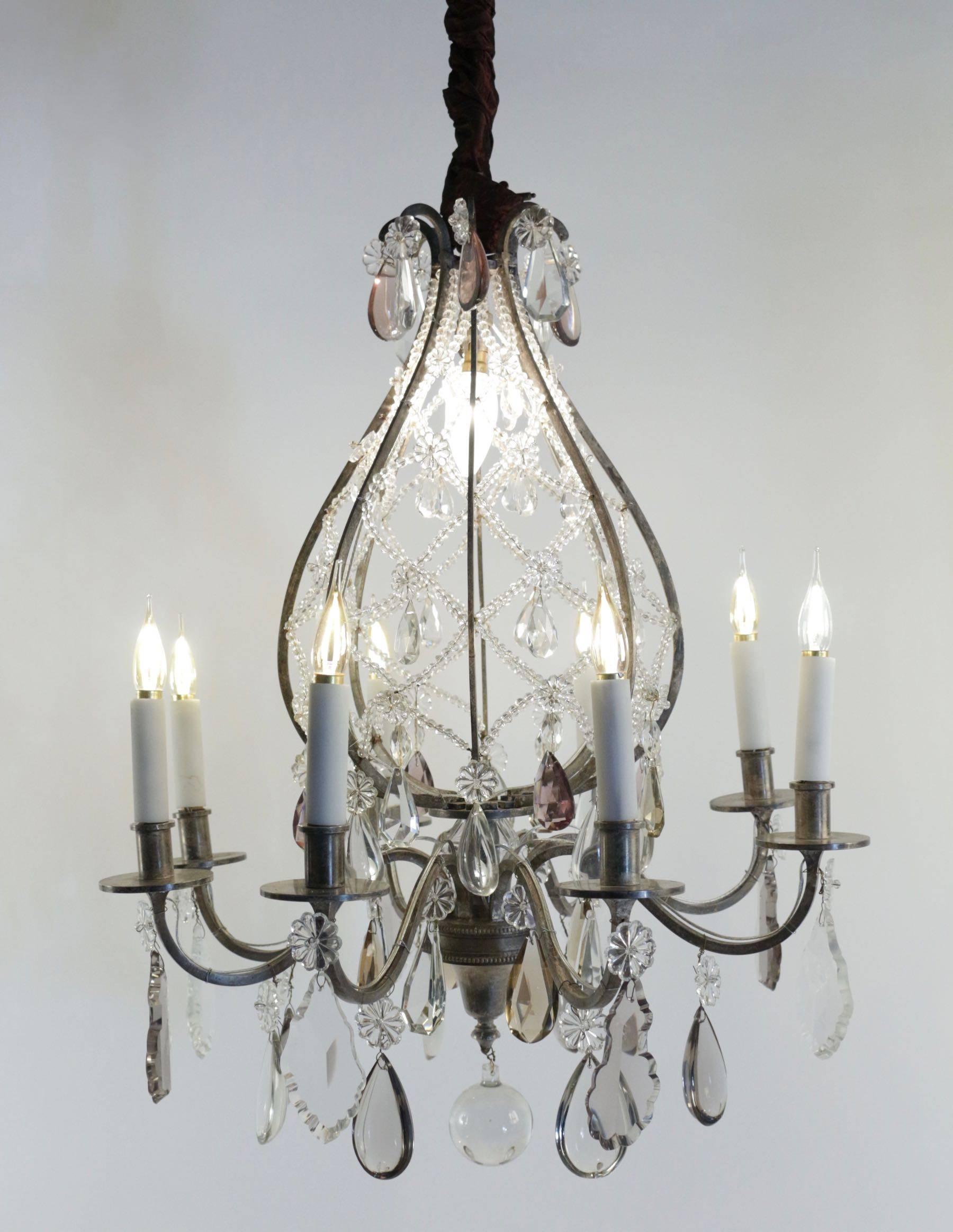 Beautiful hot air balloon style chandelier in silvered bronze of the 19th century with drop crystals, nine lights and candlesticks in opaline.
 