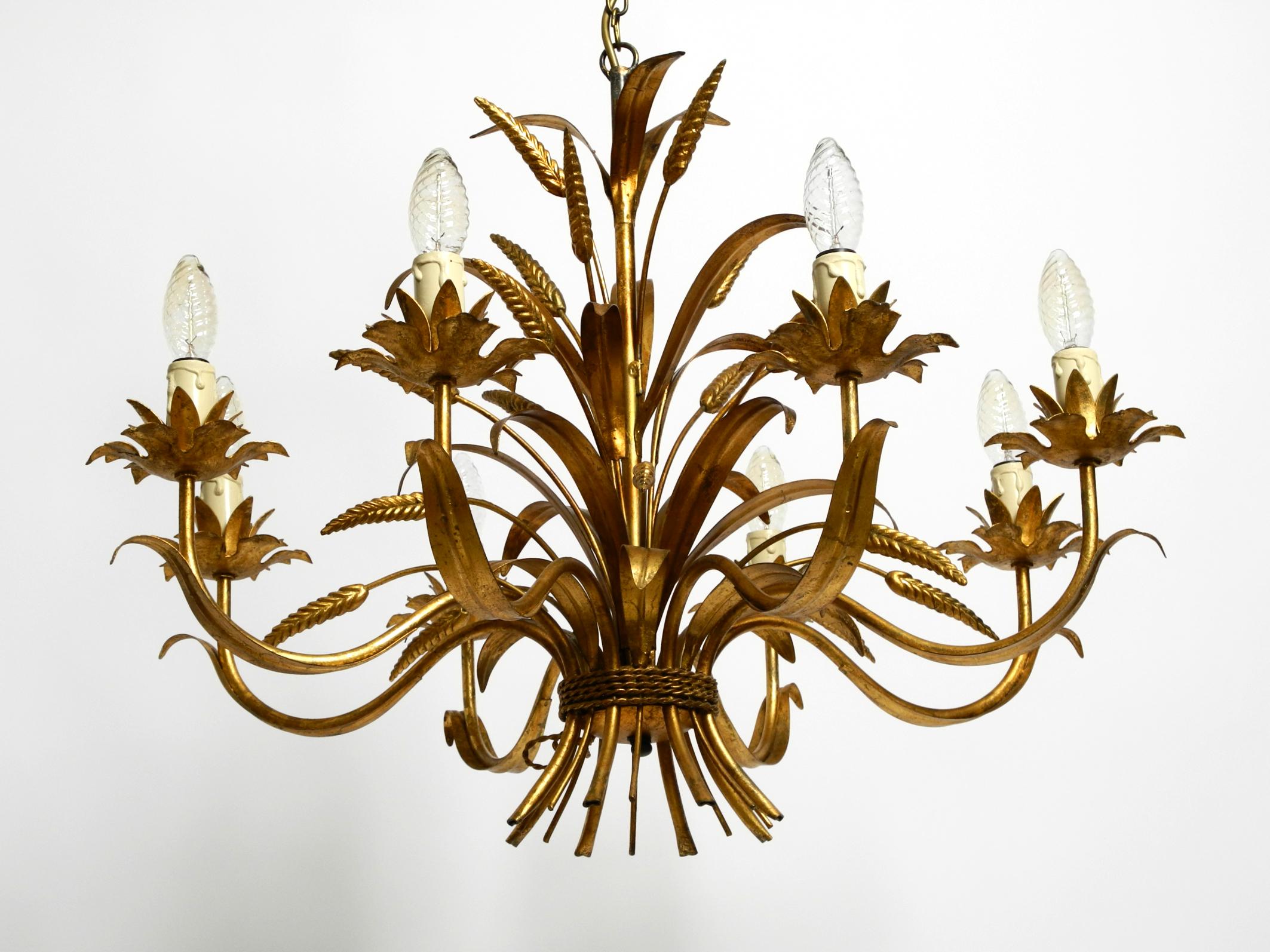 Beautiful huge 70s gold-plated 8-arm metal chandelier by Hans Kögl For Sale 7