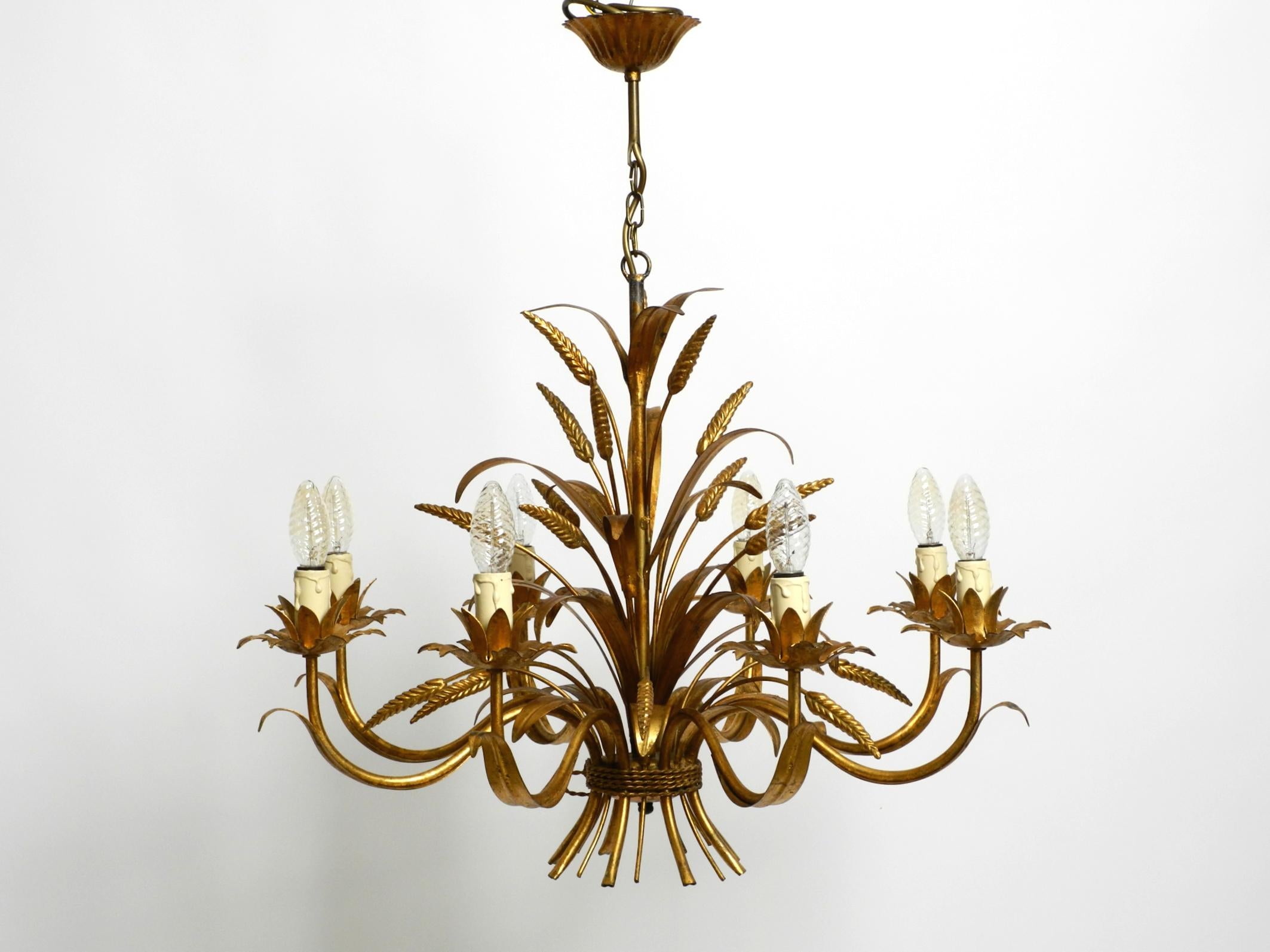 Beautiful huge 70s gold-plated 8-arm metal chandelier by Hans Kögl For Sale 8