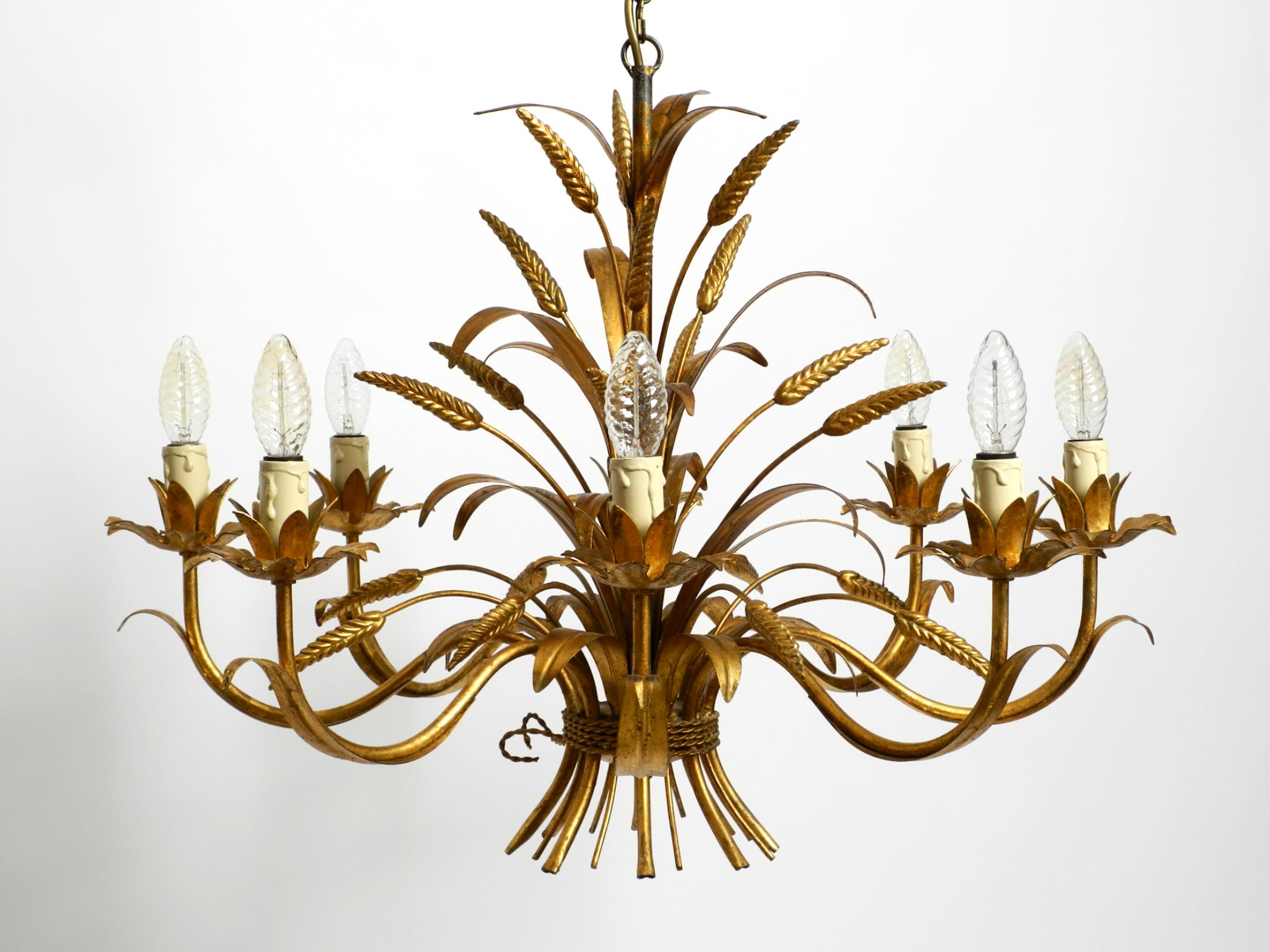 Regency Beautiful huge 70s gold-plated 8-arm metal chandelier by Hans Kögl For Sale