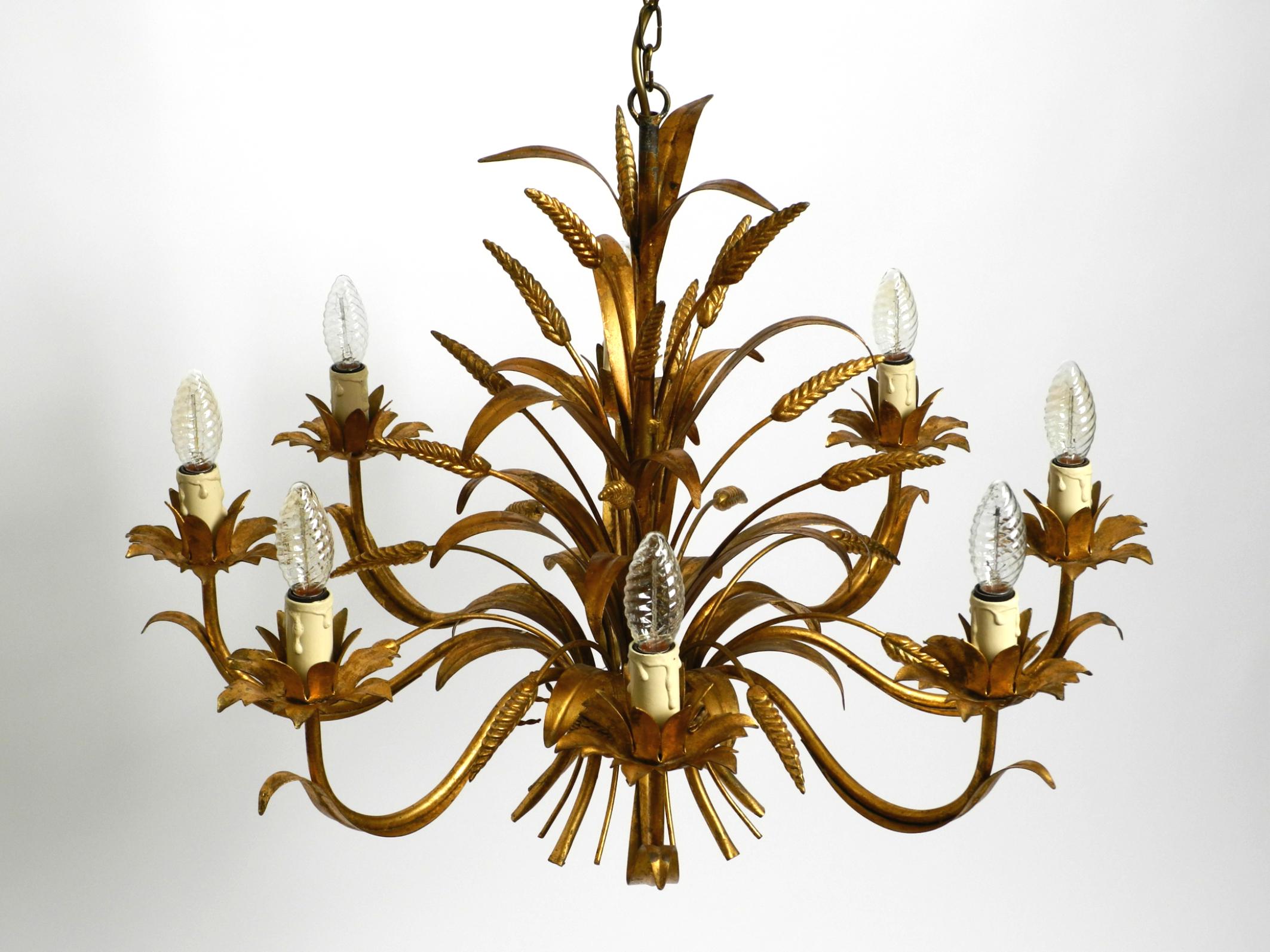German Beautiful huge 70s gold-plated 8-arm metal chandelier by Hans Kögl For Sale
