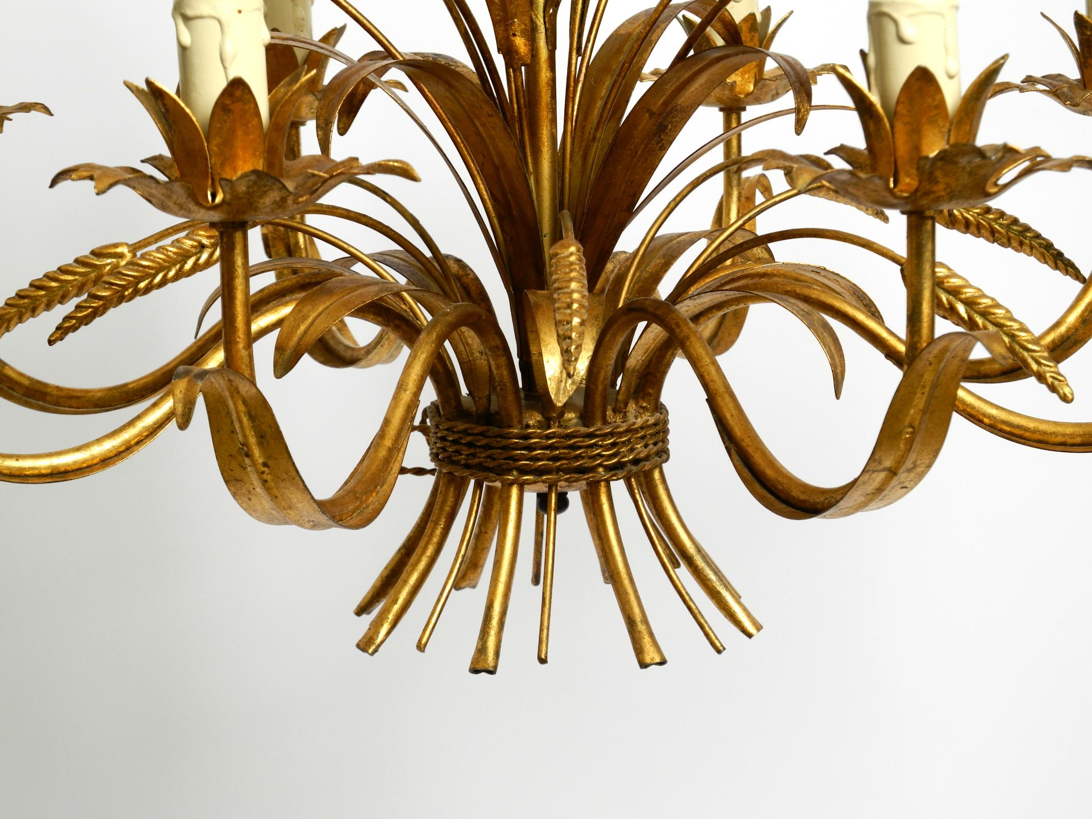 Beautiful huge 70s gold-plated 8-arm metal chandelier by Hans Kögl For Sale 1