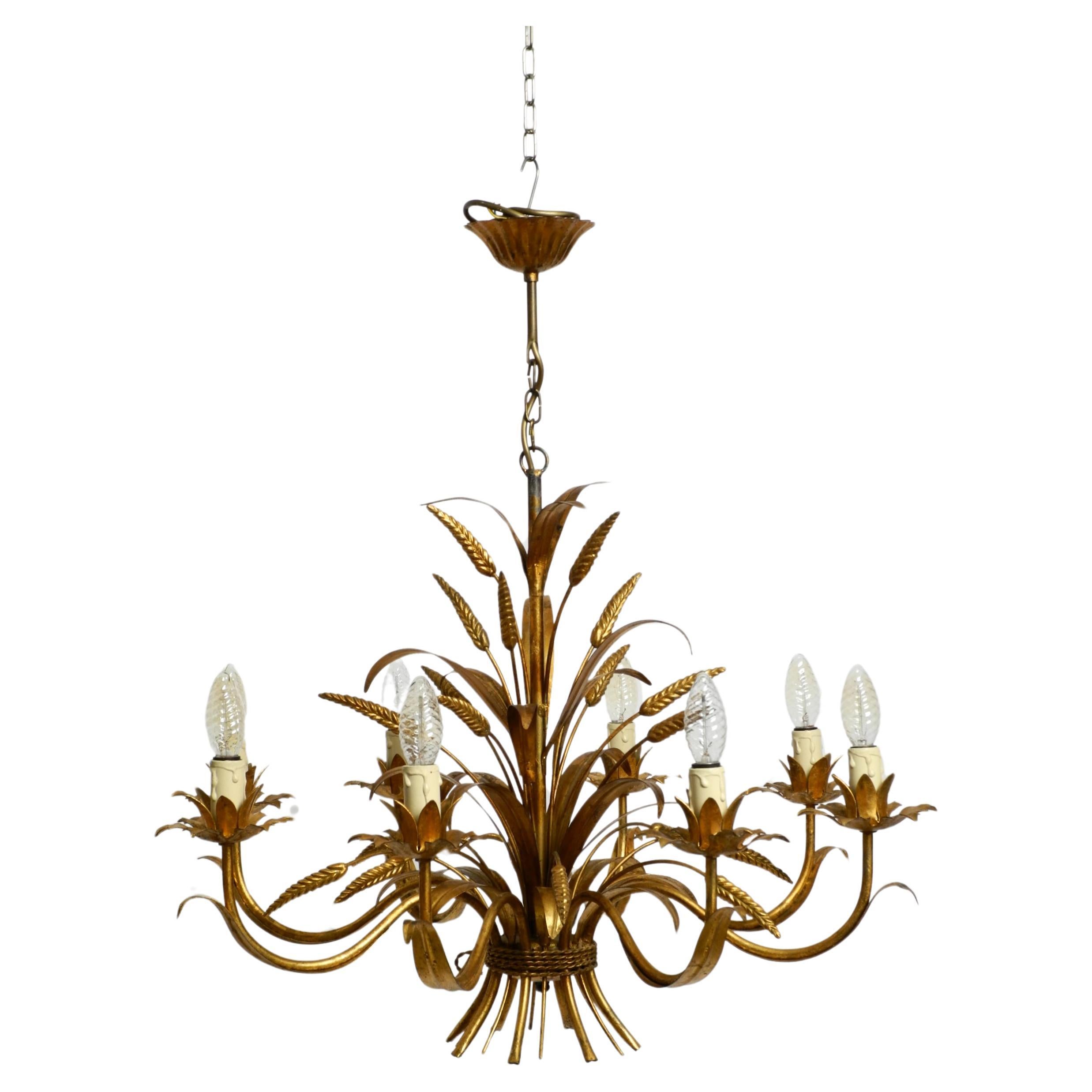 Beautiful huge 70s gold-plated 8-arm metal chandelier by Hans Kögl