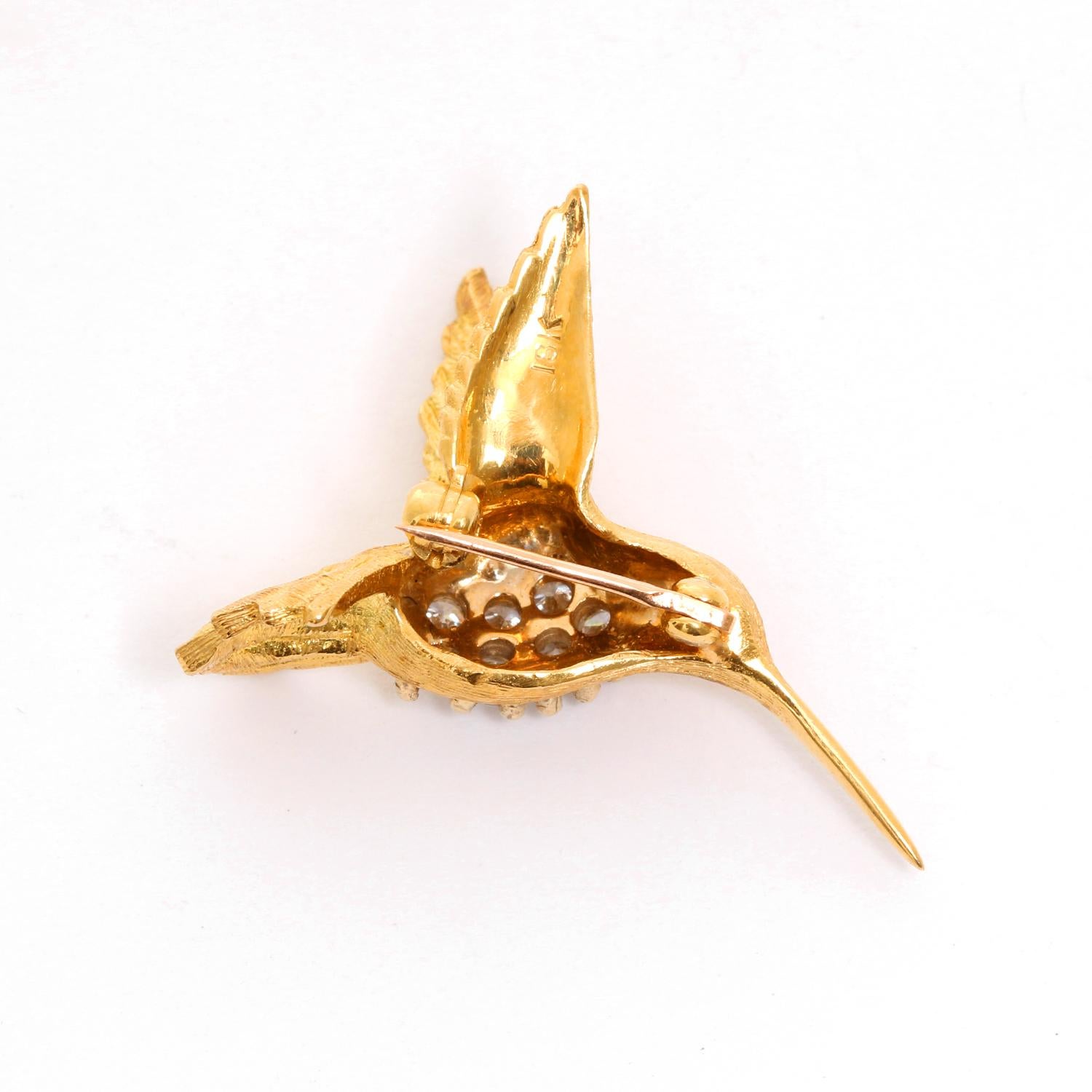 Beautiful Hummingbird Diamond and Ruby Brooch - 18K Yellow gold humming bird pendant with 7 Round Brilliant Diamonds, color G H. Diamond clarity VS. Total weight 7.2 grams. 
