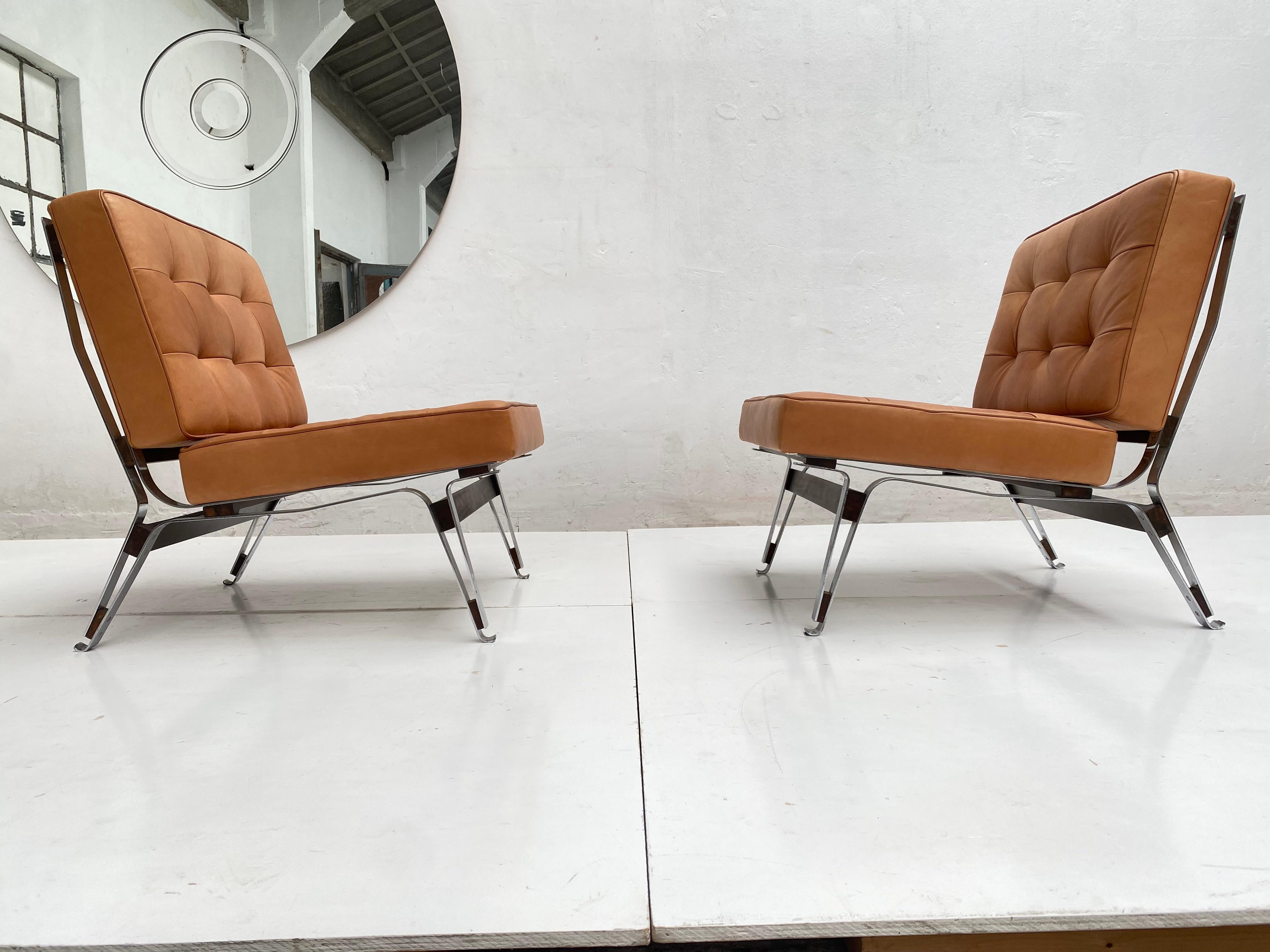 Lovely and important pair of original 1957 Ico Parisi “856” lounge chairs finished in high quality leather, manufactured by Cassina, Meda (Milan), Italy. 

.This distinctive design was chosen by the Parisi’s for use in their own “Studio la Ruota”