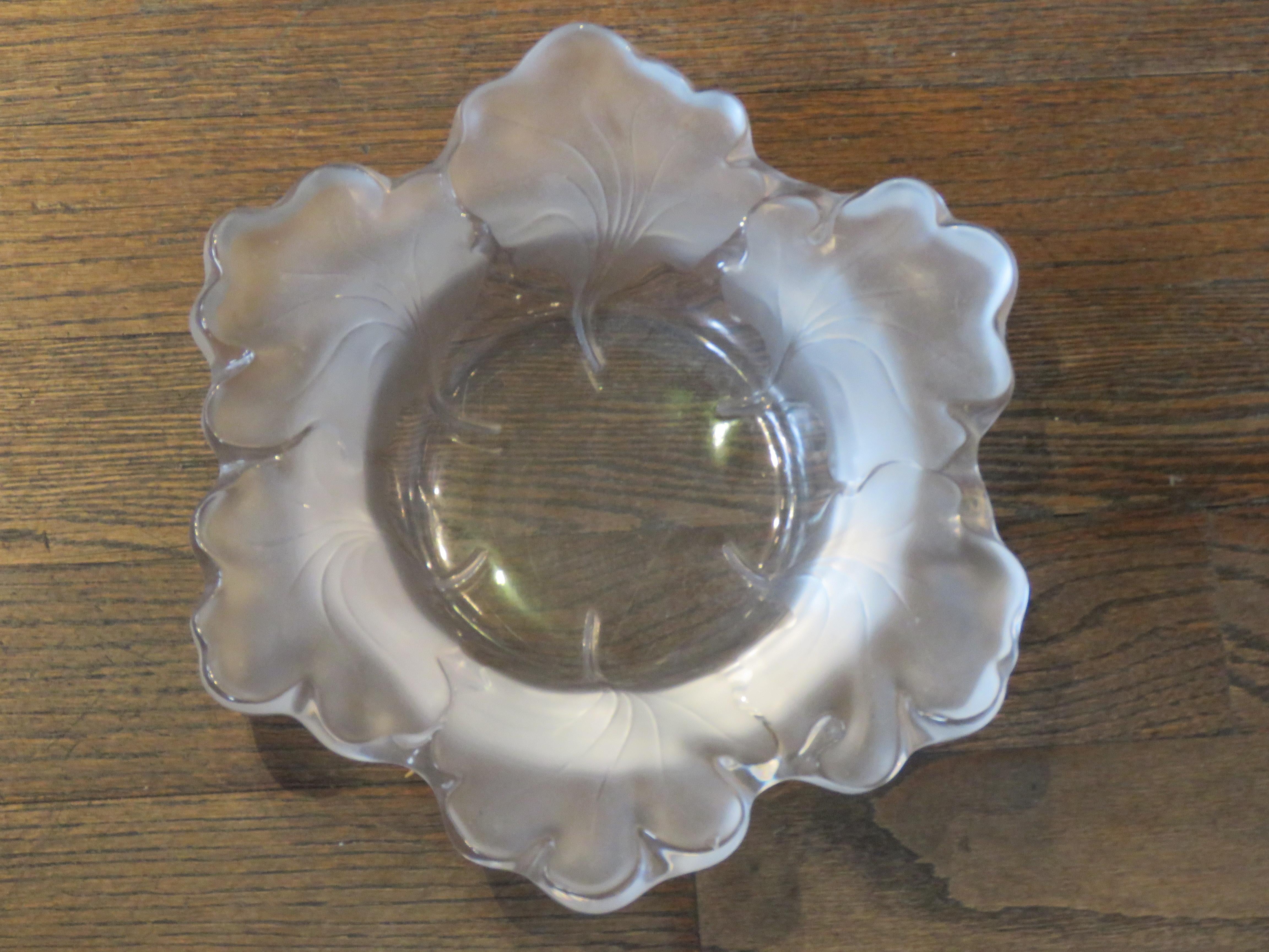 The Following Items we are offering is an Estate Lalique Large Centerpiece Leaf Bowl conjoined Around. Signed with etched Lalique France signature at base. Original Price $3000. Taken out of a $10 Million Dollar New York City Estate. 

Measurements: