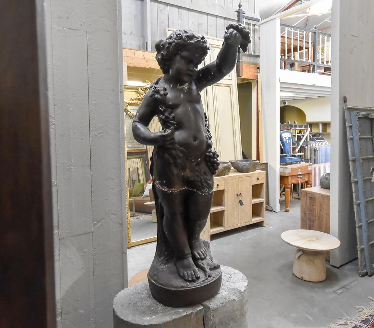 Nice iron statue from a small boy.
Recuperated from a mansion near Brussels.