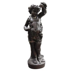 Bellissima statua in ferro di un bambino, XIX secolo