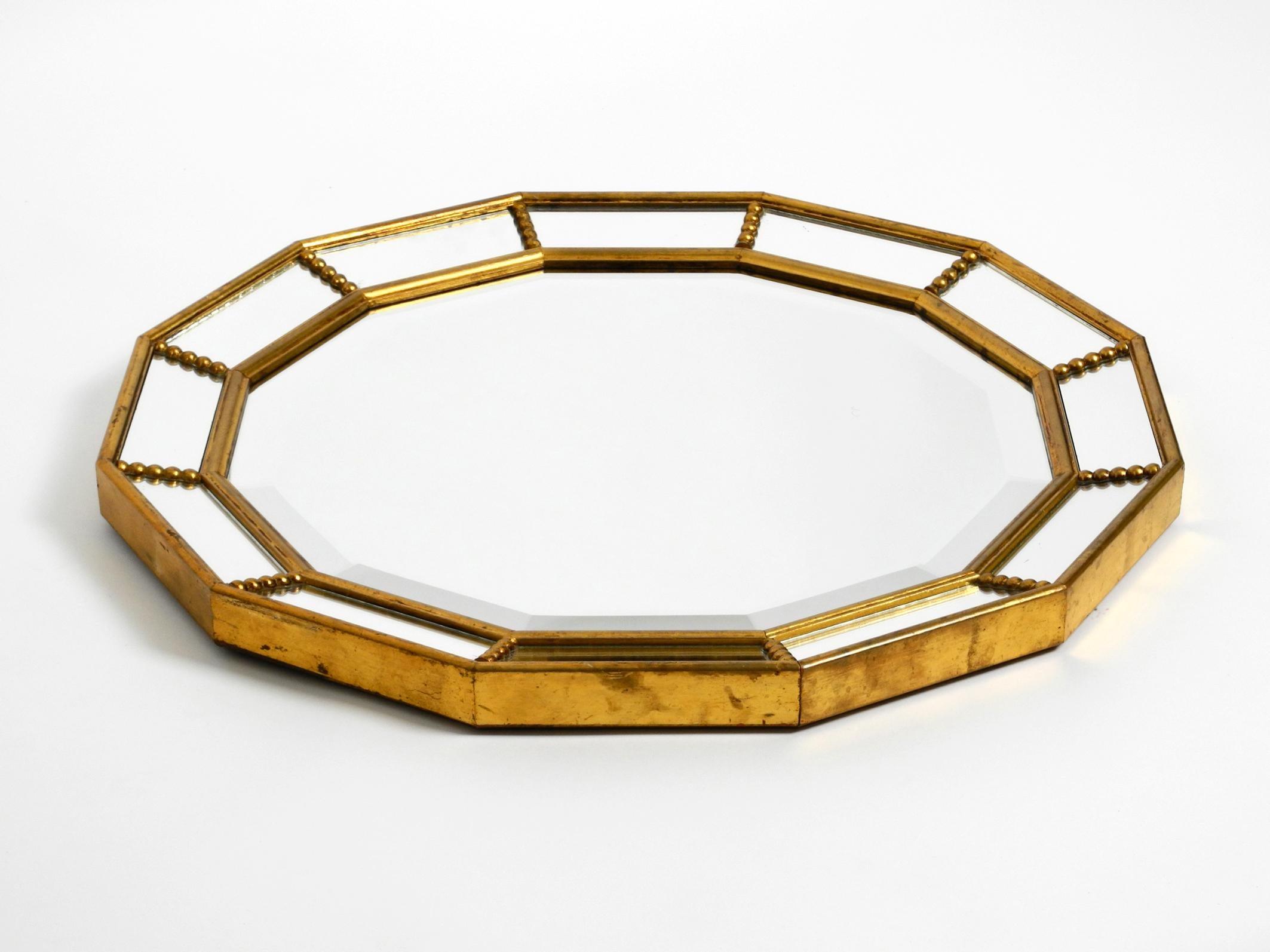 Mid-Century Modern Beautiful Italian 12 Sided Gold-Plated Wall Mirror with Facet Cut from the 1960s