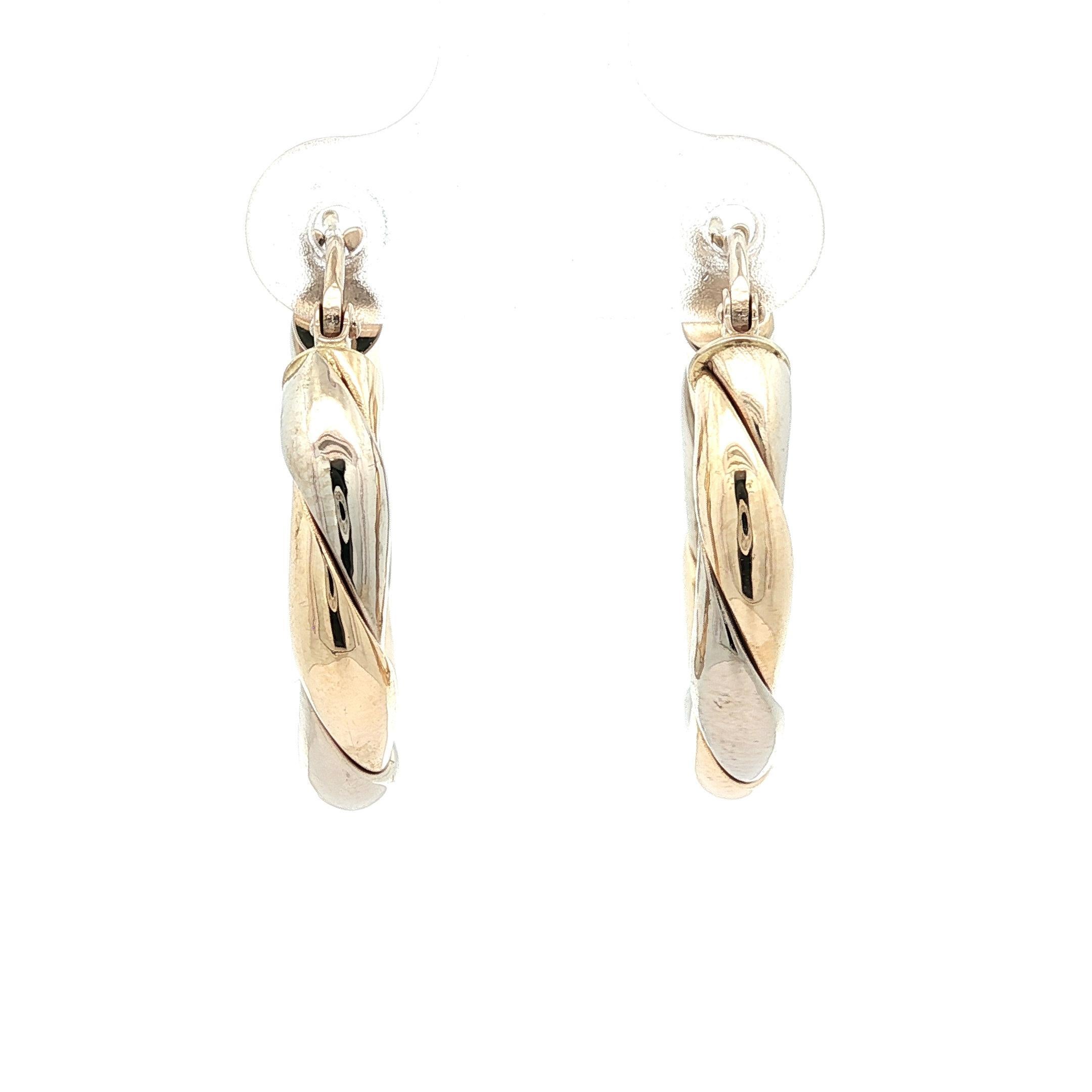 MATERIAL : Or jaune et blanc 14k massif
Poids : 5,3 grammes
Diamètre du cercle : 24,5 mm (0,96
