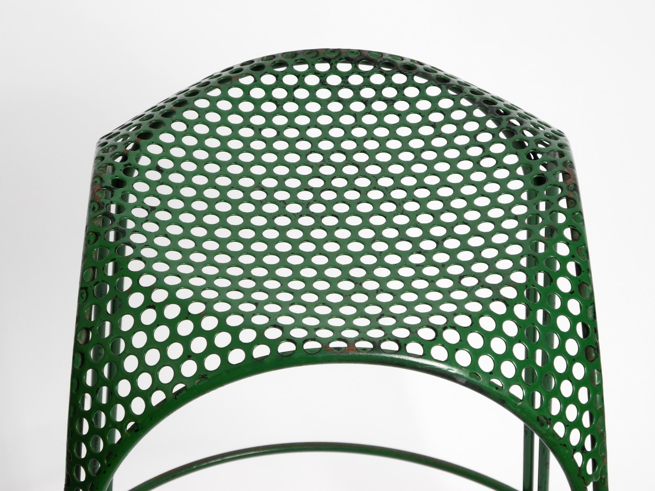 Metal Italian 1960s bar stool made of green painted metal with perforated metal seat For Sale
