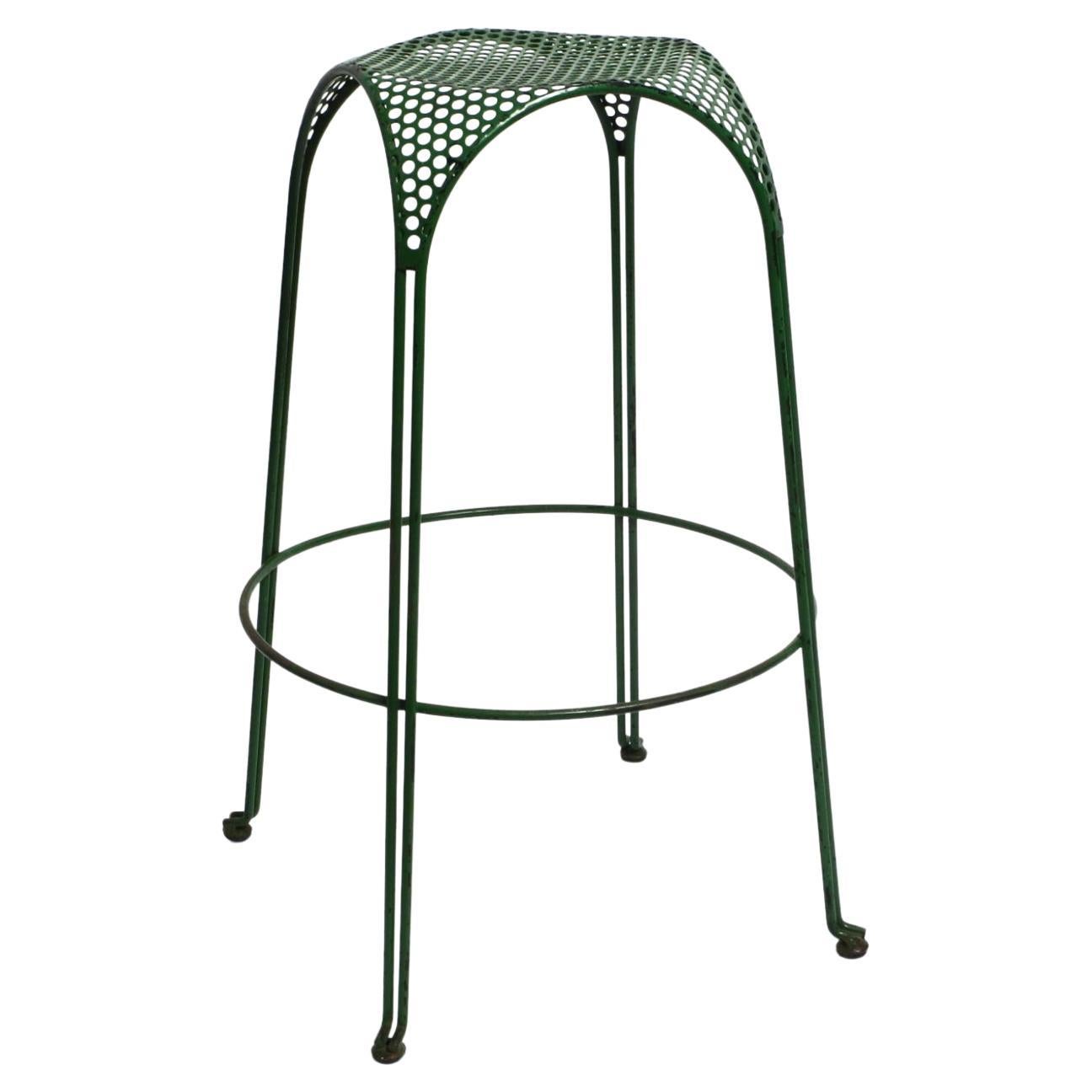 Italian 1960s bar stool made of green painted metal with perforated metal seat For Sale