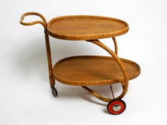 Beautiful Italian Mid Century Modern bar cart made of bamboo and teak