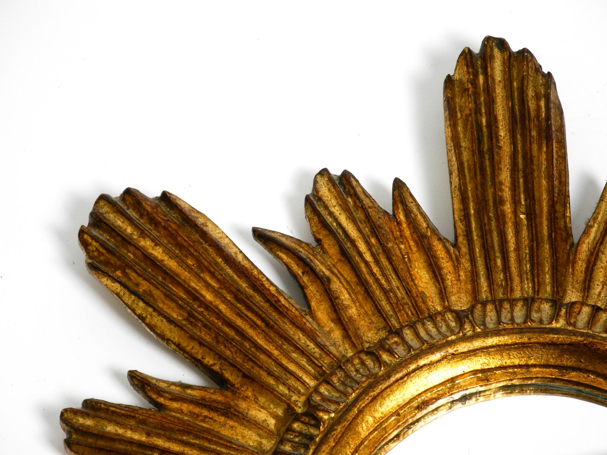 Beautiful Italian Mid Century Sunburst wall mirror made of wood gold plated For Sale 5