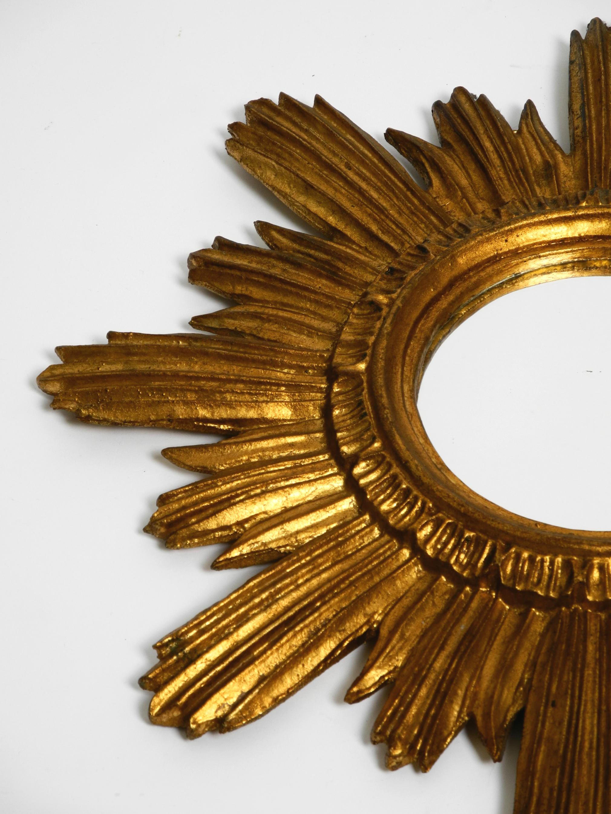 Beautiful Italian Mid Century Sunburst wall mirror made of wood gold plated 2