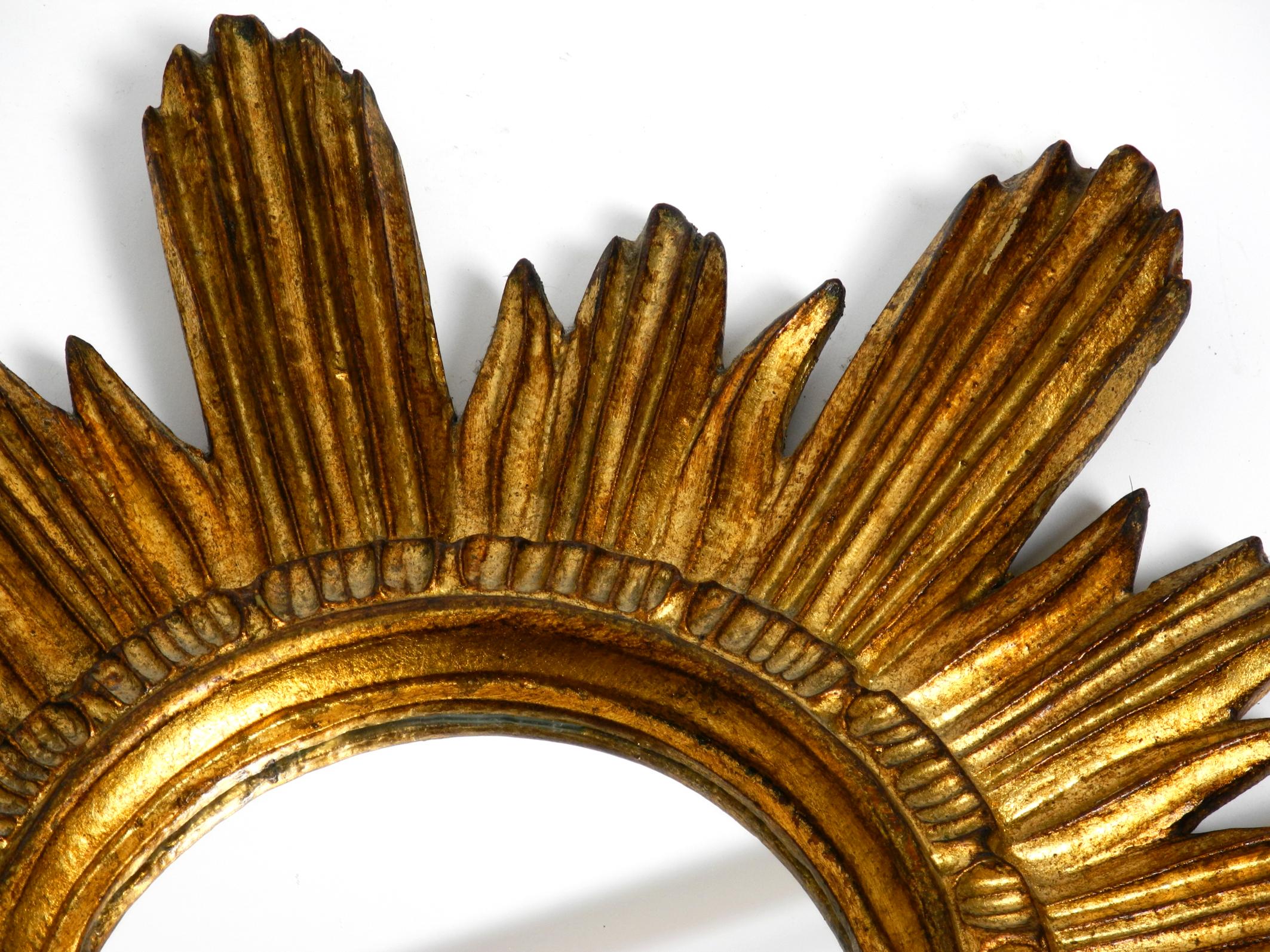 Beautiful Italian Mid Century Sunburst wall mirror made of wood gold plated For Sale 2
