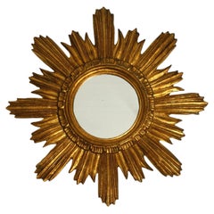 Beautiful Italian Mid Century Sunburst wall mirror made of wood gold plated