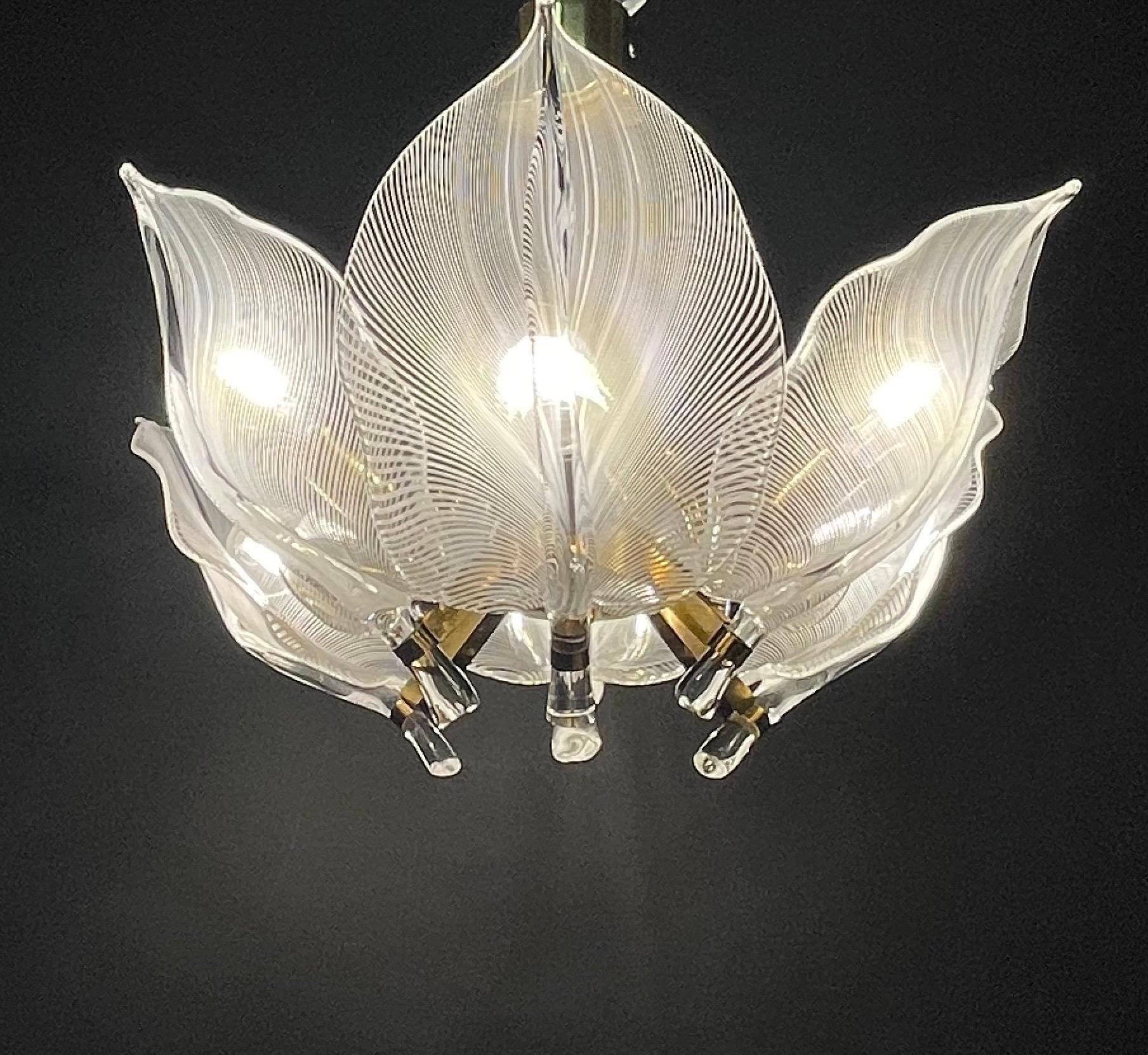 A beautiful Italian six-light clear / white striped Murano glass and gold - plated brass chandelier by Franco Luce for Seguso, circa 1970s.
Socket: 6 x e27 or E26 (for US standards).
The condition is excellent.
