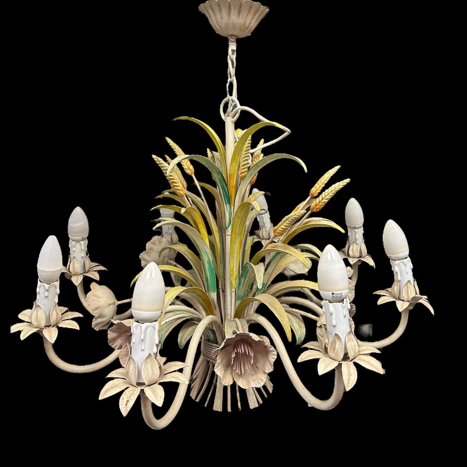 Petite Florentine style eight-light chandelier. Functions as is with eight E14 / 110 Volt light bulbs. Can take up to 40 Watts each bulb. Beautiful colored metal grasses and leaves chandelier. It gives a very warm light and represents the Italian