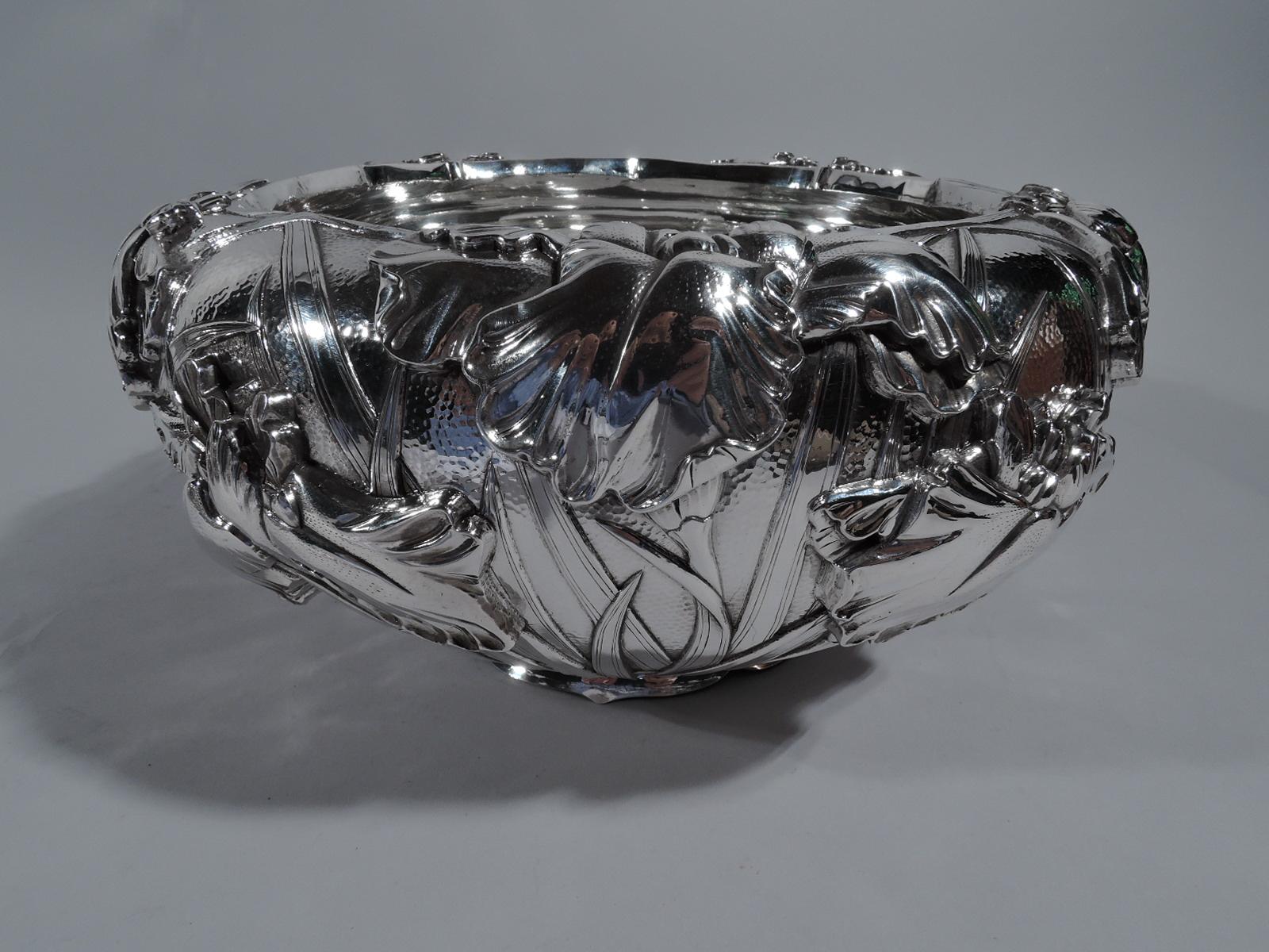 Beautiful turn-of-the-century Japanese silver bowl. Retailed by Arthur & Bond in Yokohama. Curved and tapering on plain scalloped foot ring. Sides exterior have applied irises in up-down arrangement with swaying tendrils and stems in eddying water.