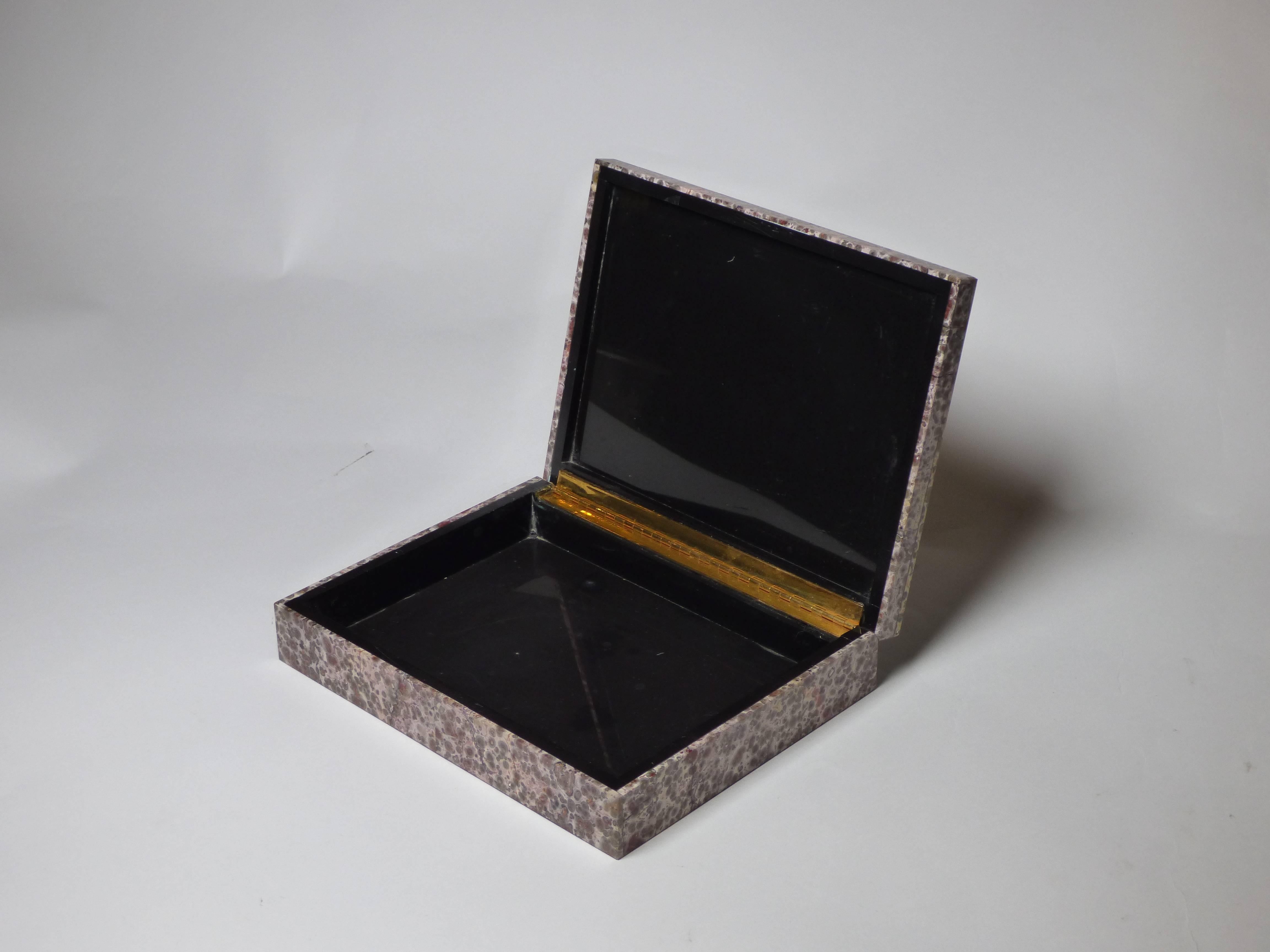 An elegant Jasper Leopardite box produced in Italy for Studio Superego with mosaic structure. Unique piece. Original label.

Biography
Superego editions was born in 2006, performing a constant activity of research in decorative arts by offering both