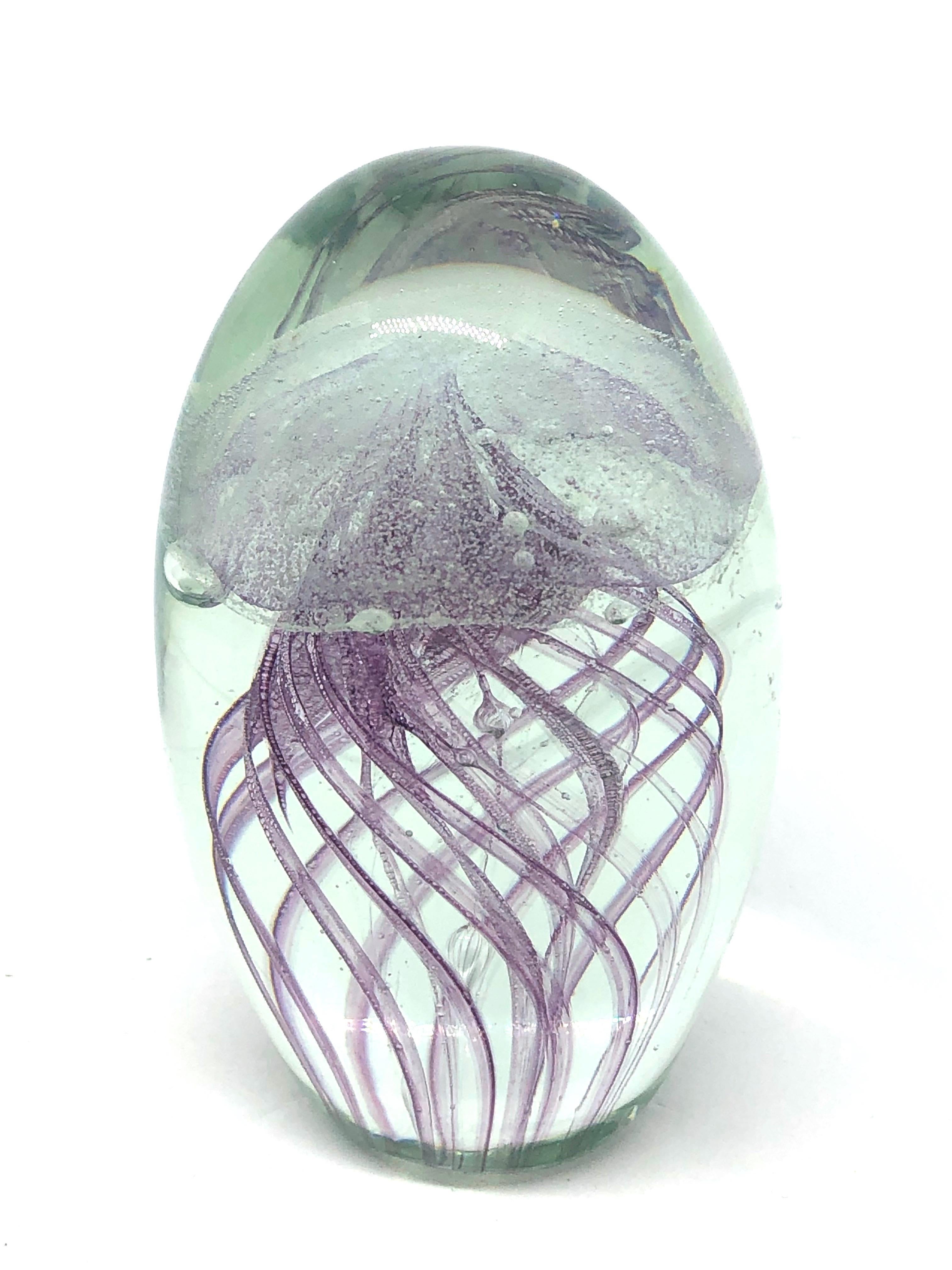 Beautiful Murano hand blown aquarium Italian art glass paper weight. Showing a purple jelly fish inside, floating on controlled bubbles. Colors are a purple and clear. A beautiful nice addition to your desktop.