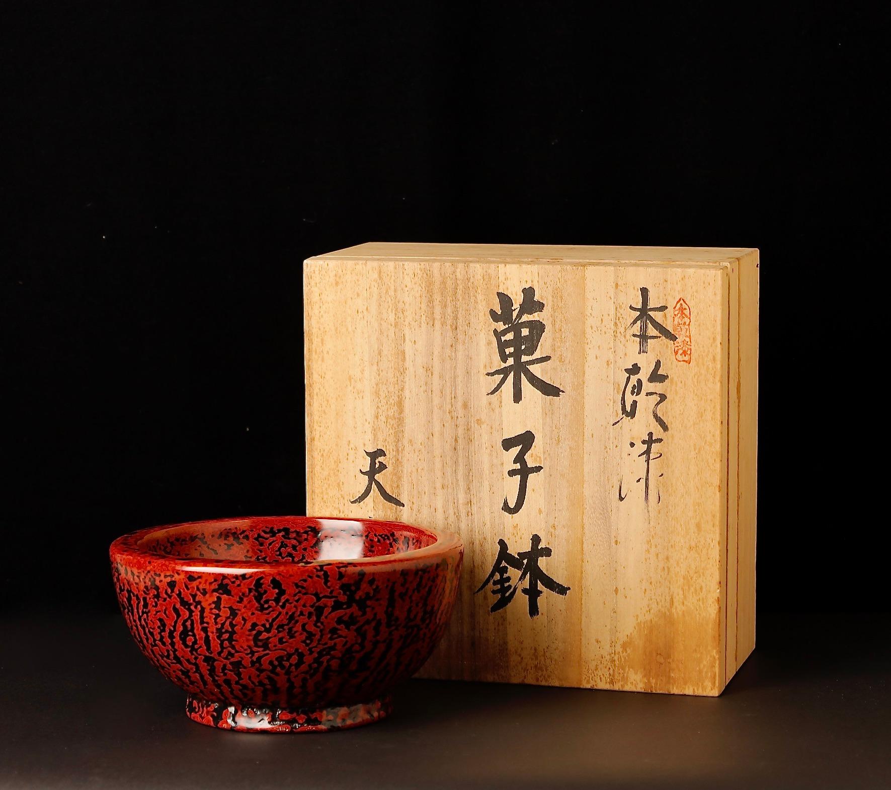 This unique Kanshitsu Bachi bowl is a remarkable piece of Japanese lacquer artistry from the Showa period (20th century). Traditionally, lacquer craftsmen applied excess lacquer from their brushes onto wooden bowls, allowing layers to accumulate