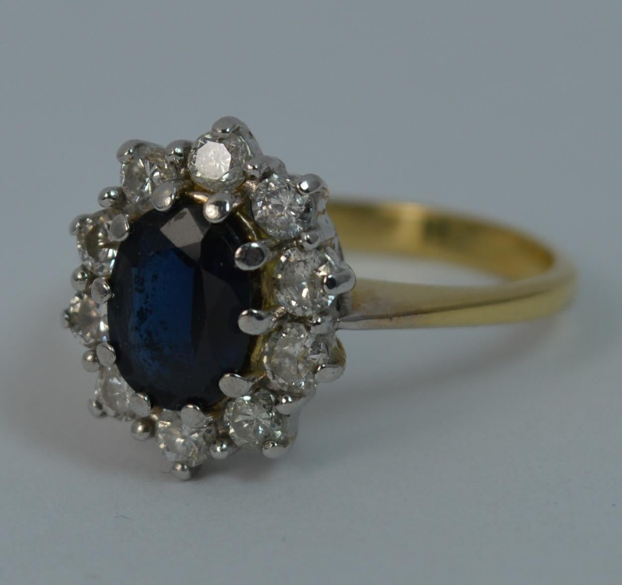 Beautiful Lady Diana Blue Sapphire and 0.60ct Diamond 18 Carat Gold Cluster Ring 5