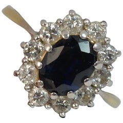 Beautiful Lady Diana Blue Sapphire and 0.60ct Diamond 18 Carat Gold Cluster Ring