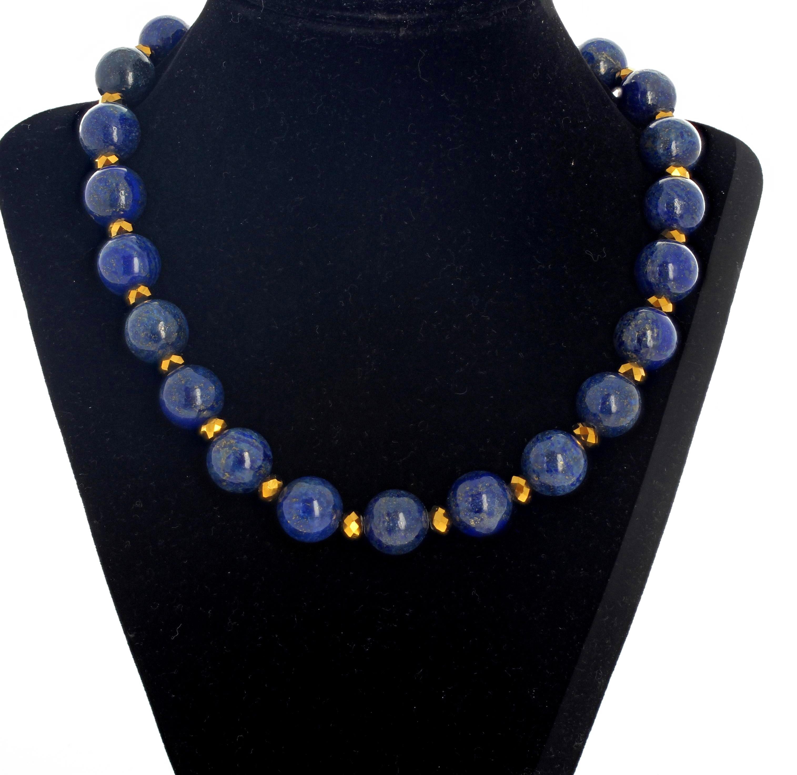 Beautiful highly polished glowing round blue Lapis Lazuli necklace with goldy tone enhancers to push the goldy streaks in the Lapis.  This handmade necklace is 17.5 inches long and they measure approximately 10.5 mm.  More from this seller by