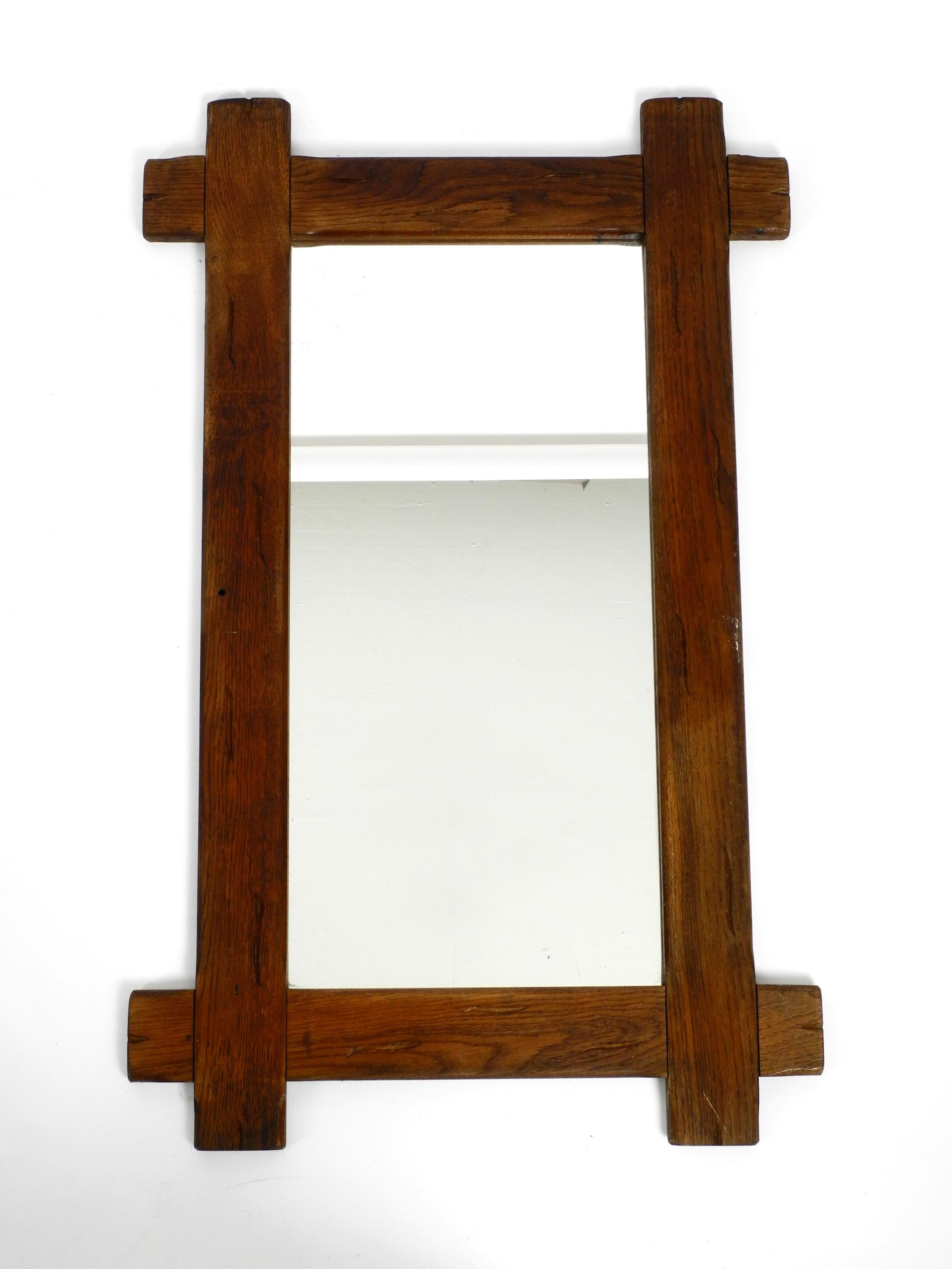 Mid-Century Modern Beautiful Large 1930's Wall Mirror with a Dark Solid Oak Frame For Sale