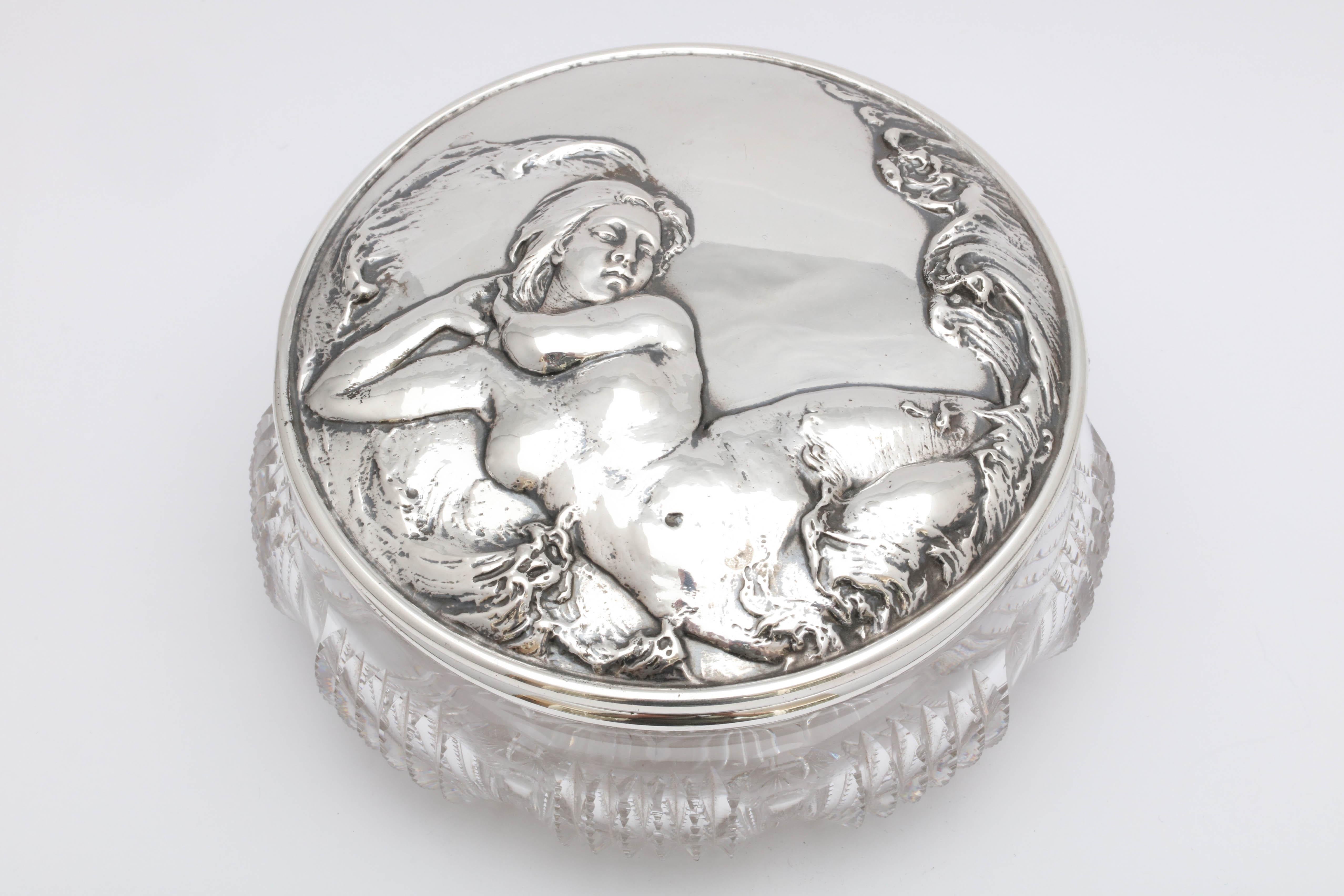 Beautiful, large, Art Nouveau, sterling silver mounted, cut crystal powder jar, Gorham Manufacturing Corp., Providence, Rhode Island, year hallmarked for 1903. Sterling silver lid displays a beautiful, Art Nouveau, nude, woman with long, flowing