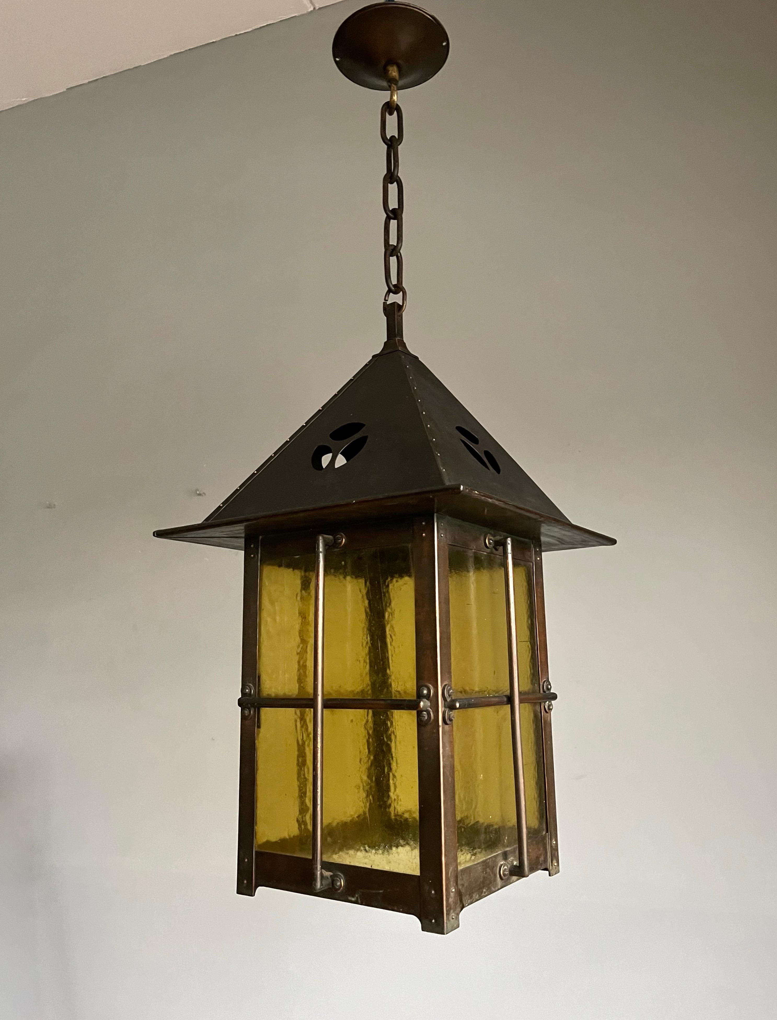 Impressive and finer quality craftsmanship light fixture. 

If you are a collector of truly original and all-handcrafted art and antiques then this large and one of a kind pendant could be flying your way soon. With antique light fixtures being