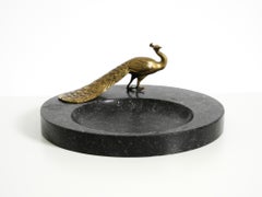 Beautiful, large black granite valet tray featuring a brass peacock, circa 1920