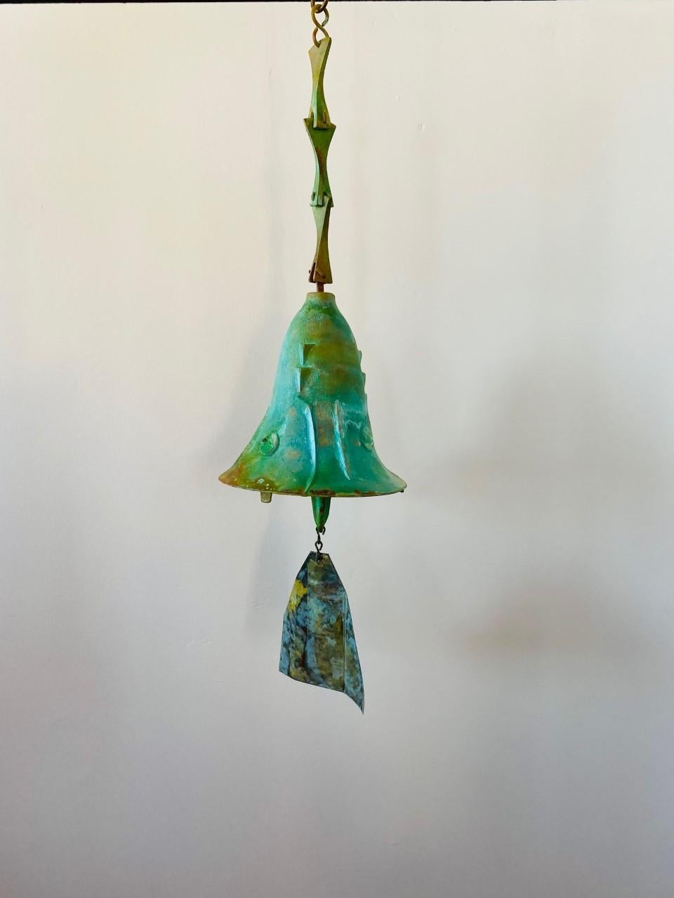 Beautiful large bronze Cosanti bell by Paolo Soleri. Uncommon shape and design. Fantastic patina and a great sound. Signed. A unique piece from a celebrated artist. Unique attribute to this piece is a bluish green patina. The beauty of the burnished