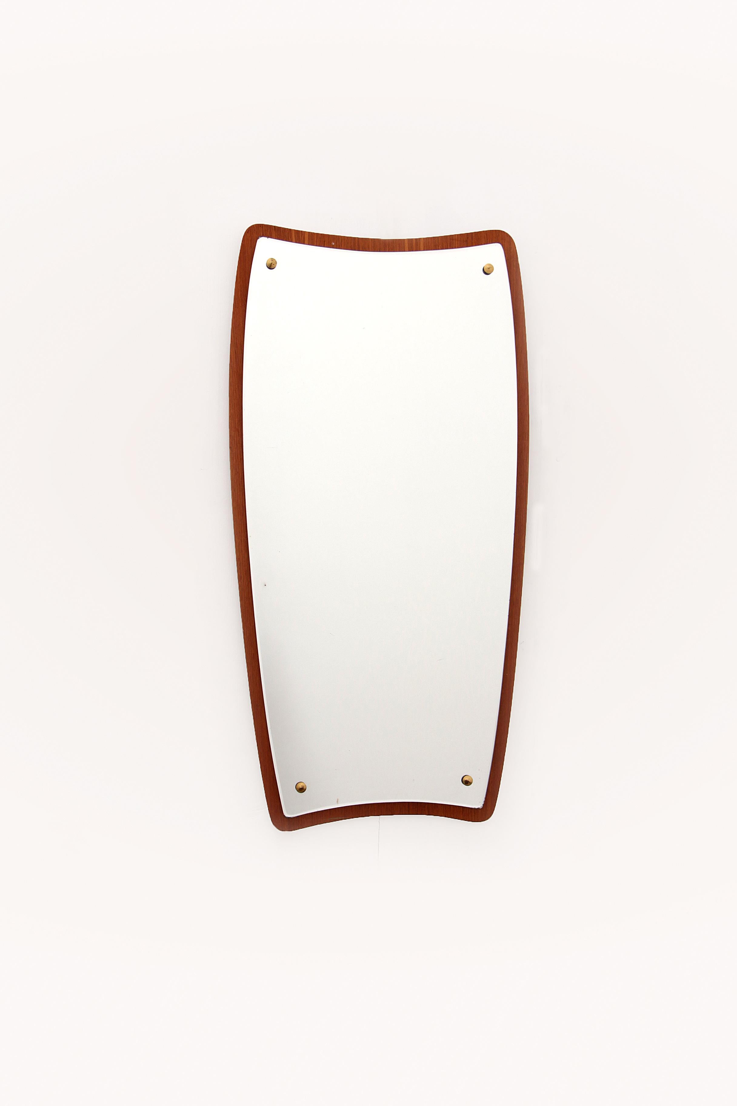 This is a beautiful large hanging mirror that has always been used in the hall. Made in Denmark around the 1960s

The mirror is attached to a beautiful teak bottom plate with decorative screws.

Sustainable: environmentally conscious By