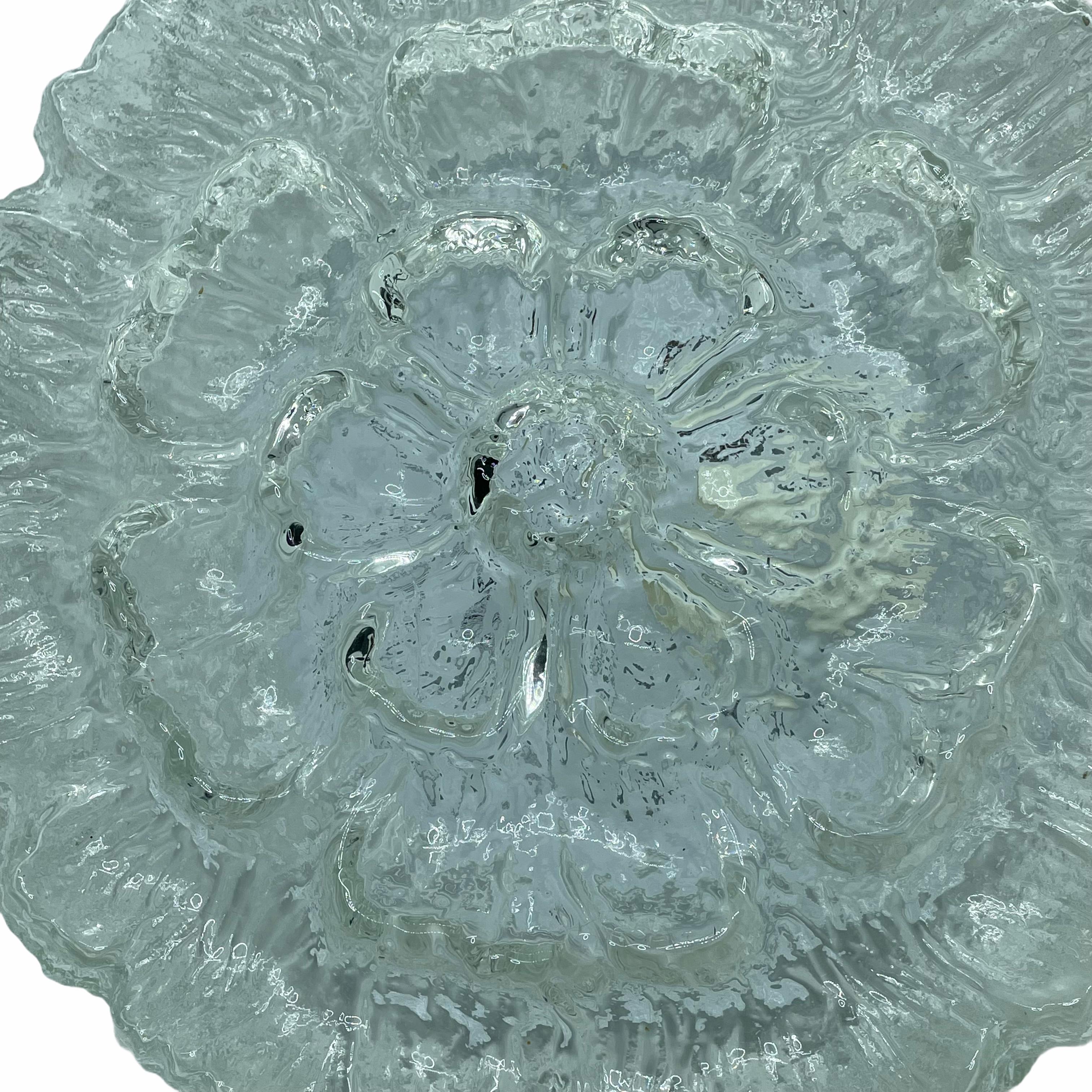 Large flower pattern clear glass flush mount. Made in Germany by Massive Leuchten. Gorgeous textured glass flush mount with metal fixture. The Fixture requires one European E27 / 110 Volt Edison bulb, up to 60 watts. You can also use it as a sconce