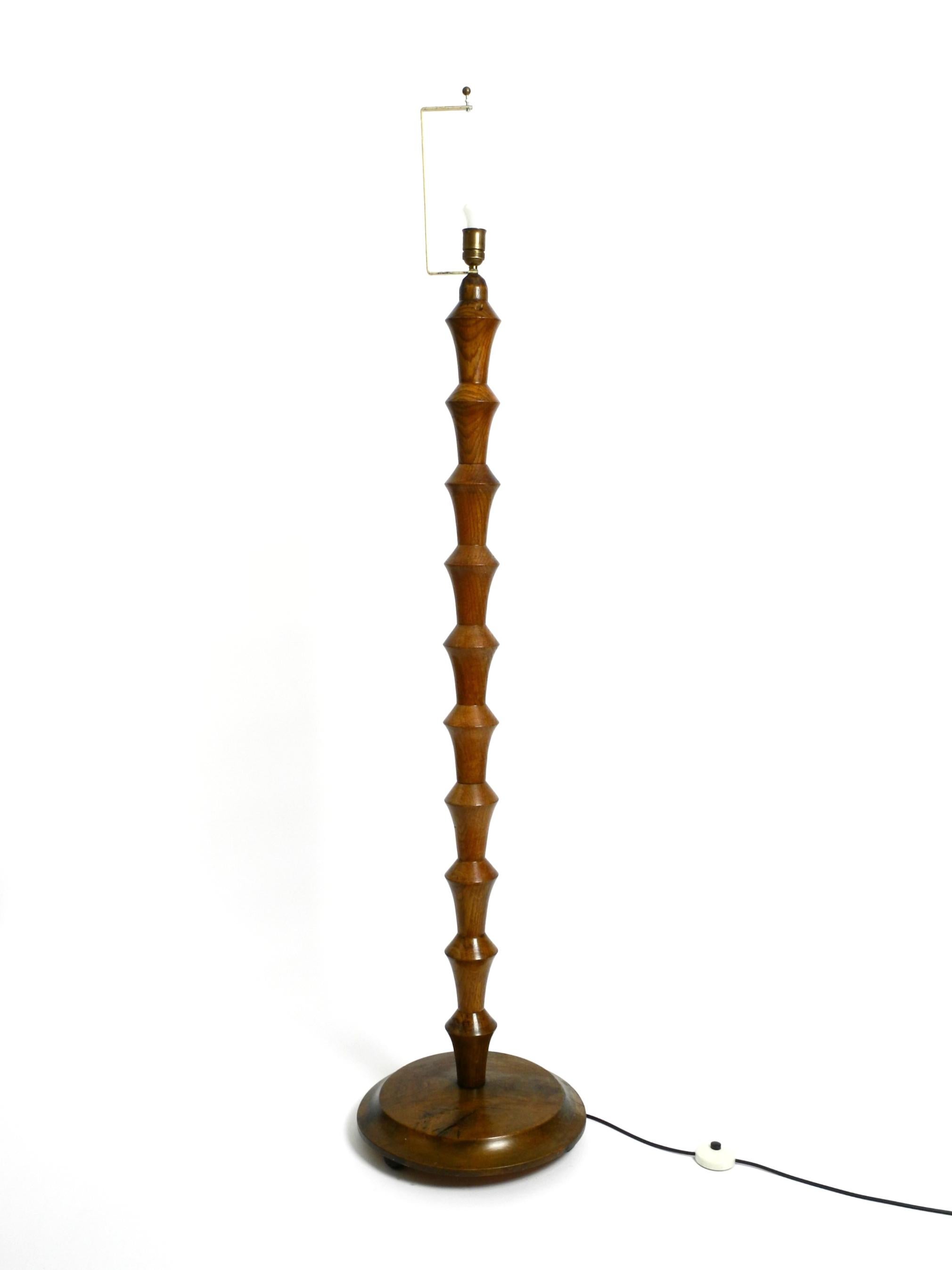Beautiful, large, original German 1930s floor lamp made of dark oak without a shade.
Great 1930s design in very good vintage condition.
Complete lamp made of solid oak.
100% original condition and fully functional. Very few signs of wear.
The base