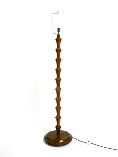 Beautiful large German 1930s floor lamp made of dark oak wood without shade