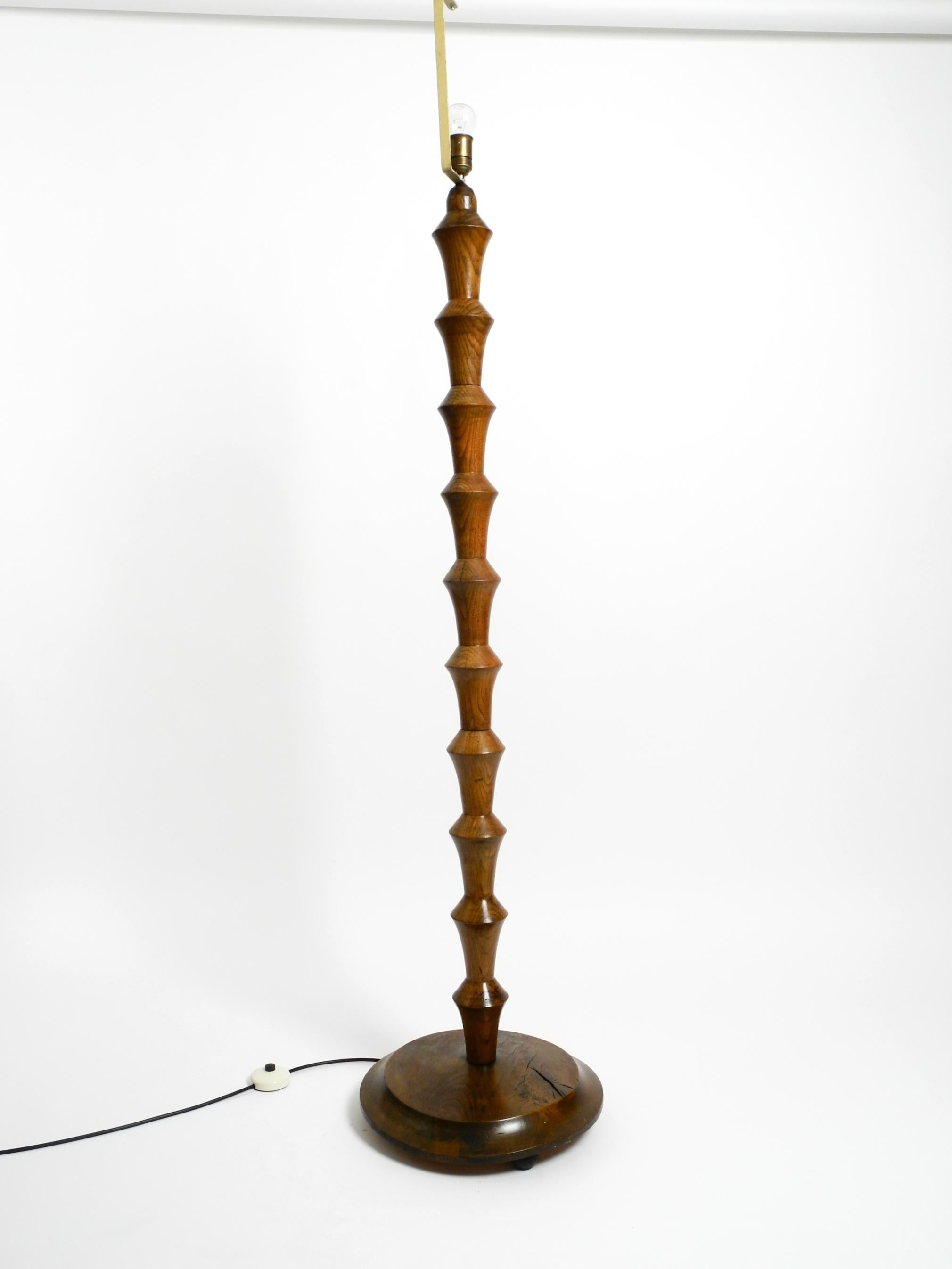 Mid-Century Modern Beautiful large German 1930s floor lamp made of dark oak wood without shade For Sale