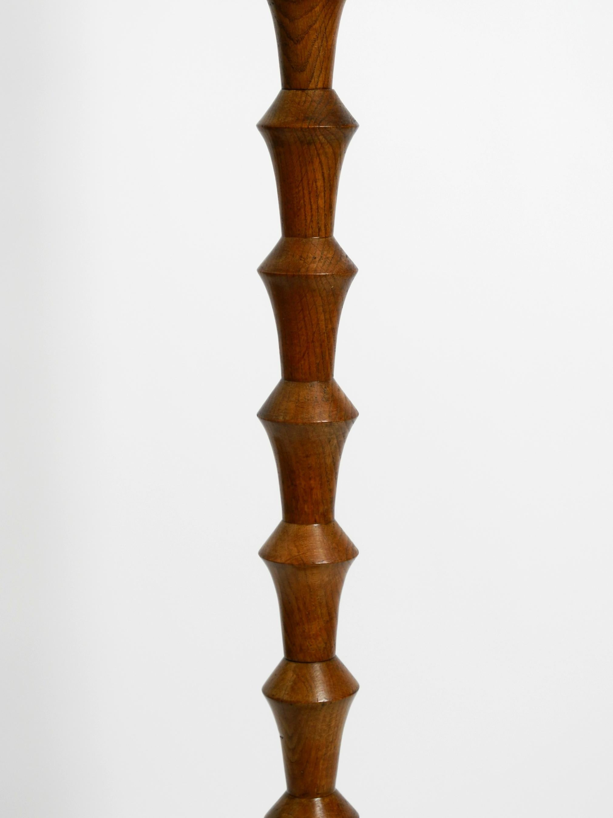 Mid-20th Century Beautiful large German 1930s floor lamp made of dark oak wood without shade For Sale
