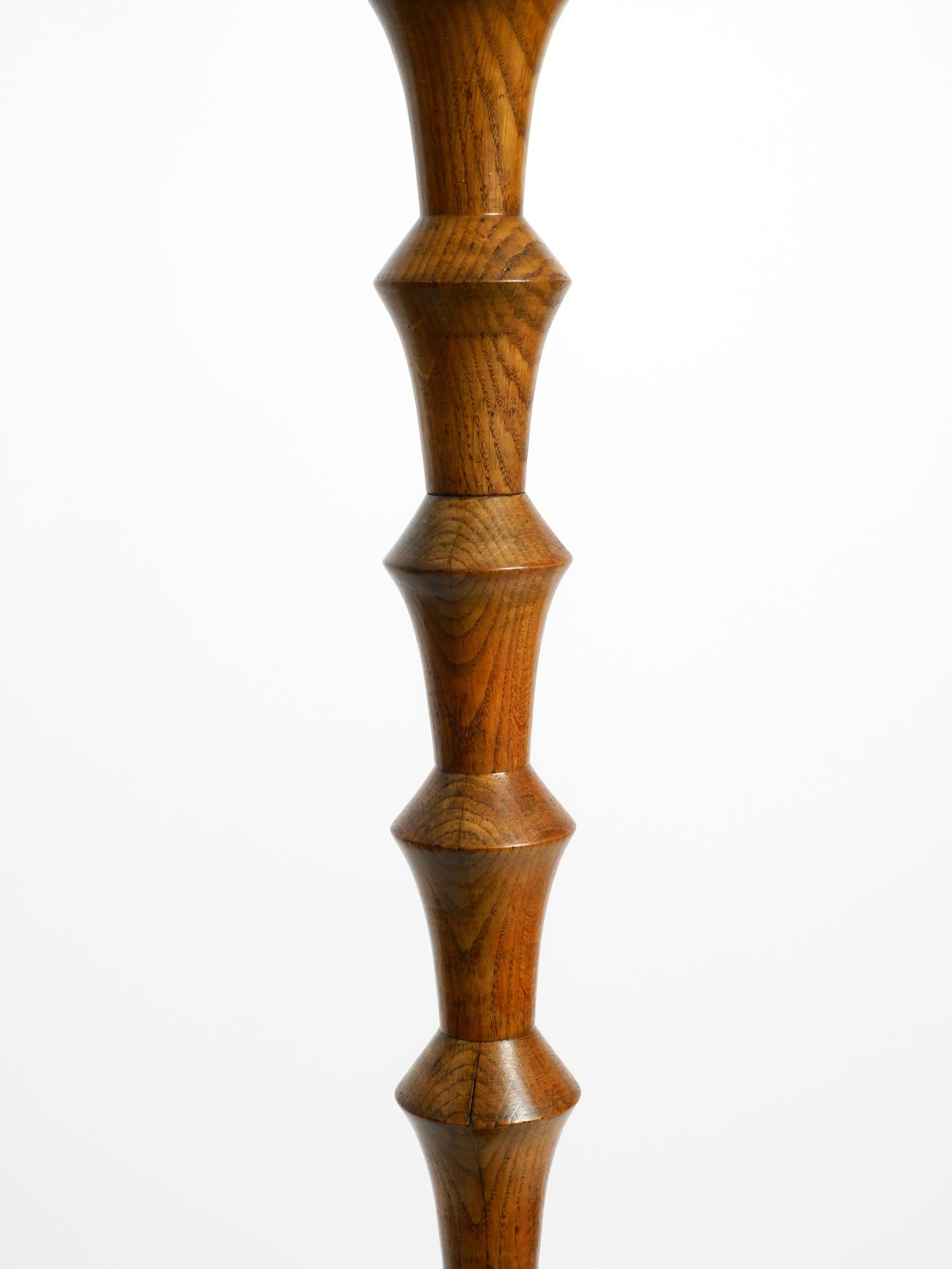 Metal Beautiful large German 1930s floor lamp made of dark oak wood without shade For Sale