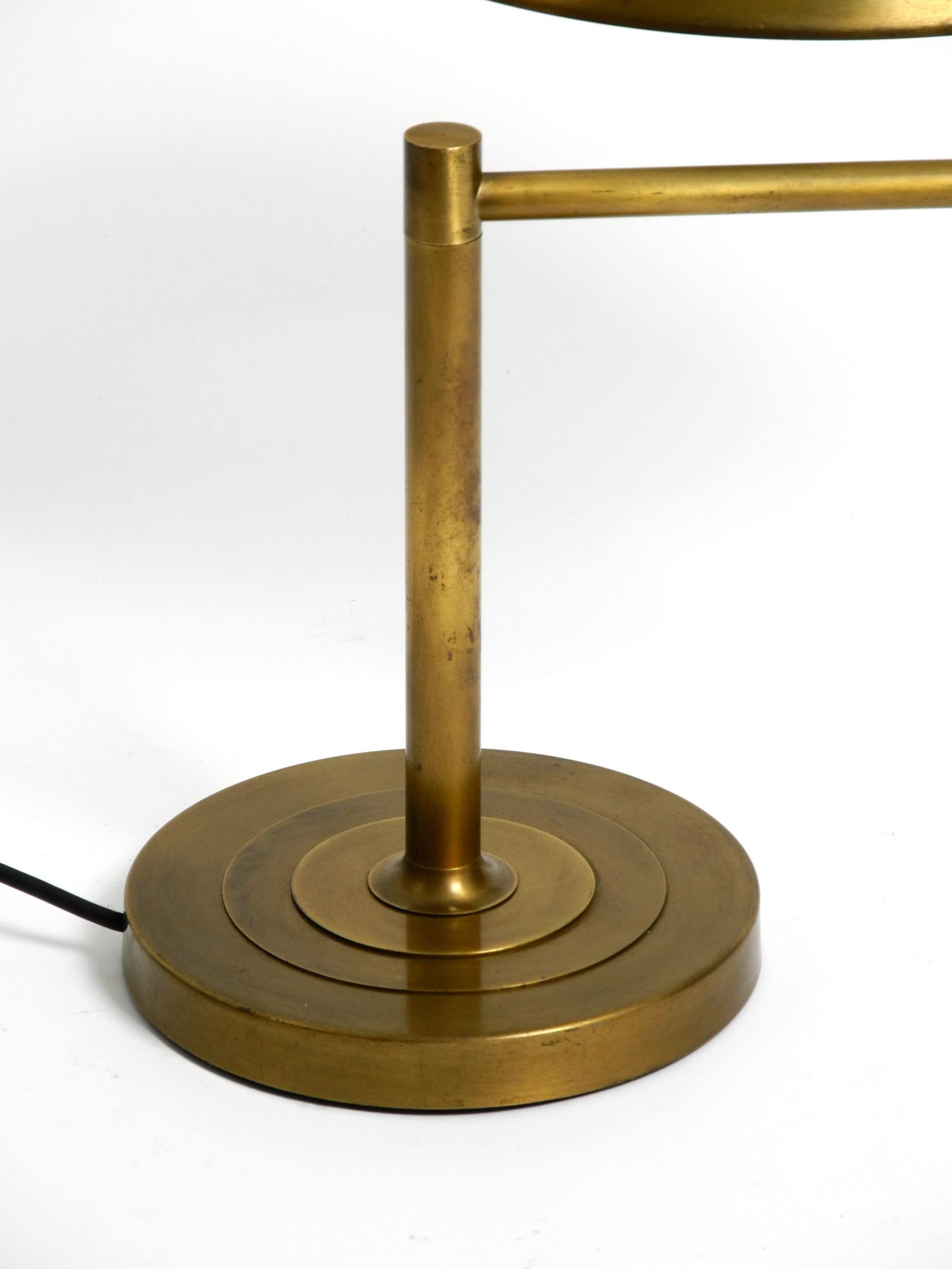 Brass Beautiful large heavy Mid Century Modern brass table lamp with swivel joint For Sale
